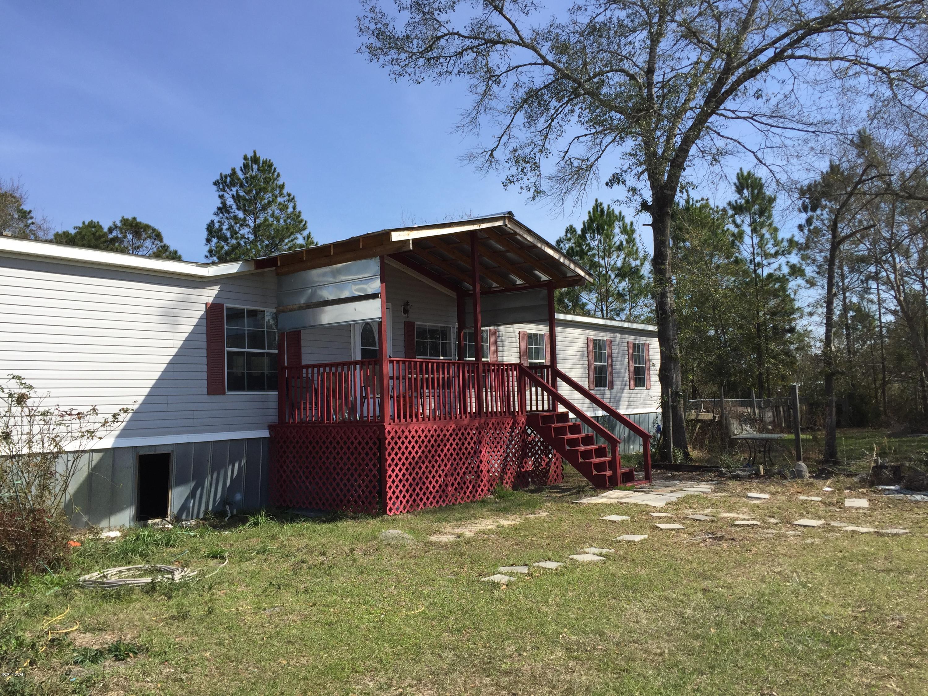 Conveniently located country living. This 3 bedroom, 2 bath manufactured home sits on 1.5 fenced acres. Storage sheds, screened back porch and new covered front porch. Adjacent 1.5 acres also for sale.