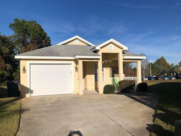 'CURRENTLY UNDER CONTRACT, SELLER ACCEPTING BACKUP OFFERS Fully Furnished and Already Making Money! This 3/2 is located one block from The World's Most Beautiful Beaches in the community of Palm Cove. Perfectly located so that anything you need is a golf cart ride away, Publix, restaurants, you name it, it's close by.  One owner for the life of the home. Upgrades include a fully covered and screened in back deck, tile in living room for ease of cleaning, hood vent for microwave and oven is vented to the OUTSIDE of the home (unlike other homes in this same community). Keycode entry lock. Upgraded ceiling fans throughout home and front porch along with upgraded appliances. House is tenant occupied (Military renter) via a month-to-month agreement, no long-term lease to assume. If you are looking for an investment property this is perfect as you are already getting a return on your money with the current renter if you choose to keep them. If not, this is perfect for short term rentals as it is being sold fully furnished and is one block from the beach! 
For the possible first-time homebuyer, this house is perfect. Amazing price point, only one block from the sand. Centrally located around food and entertainment. Community is gated after a certain time of day so renters or owners can enjoy some extra security and controlled access. Do not miss out on this chance to get on the beach for under $300k!!