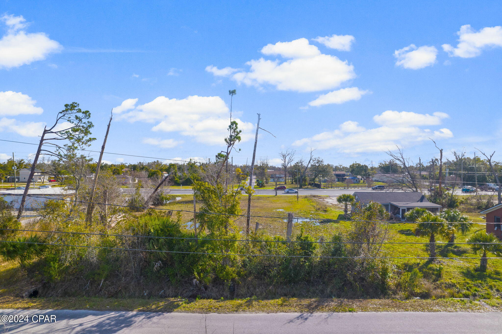 Discover the potential of this exceptional lot. This property is zoned R-1 Boasting approximately 84 ft of frontage on Louisiana Ave and a depth of about 101 ft, this 0.231-acre property is an enticing opportunity for development.

The prime location offers unmatched convenience, with walking distance access to Bay High School, Harrison Ave, City Transportation, and Bay Town trolley stops. Proximity to Ascension Sacred Heart Bay, Downtown Panama City, and the city's vibrant attractions adds further allure. Positioned in a Panama City Opportunity Zone, this property comes with numerous benefits for savvy investors.

Furthermore, this lot seamlessly connects to a commercial property at 1121 MLK Blvd, zoned GC-2 and listed for sale at $70,000. This connection opens up a realm of possibilities, making it an attractive proposition for those considering both residential and commercial ventures. Don't miss out on the potential this unique property holds!