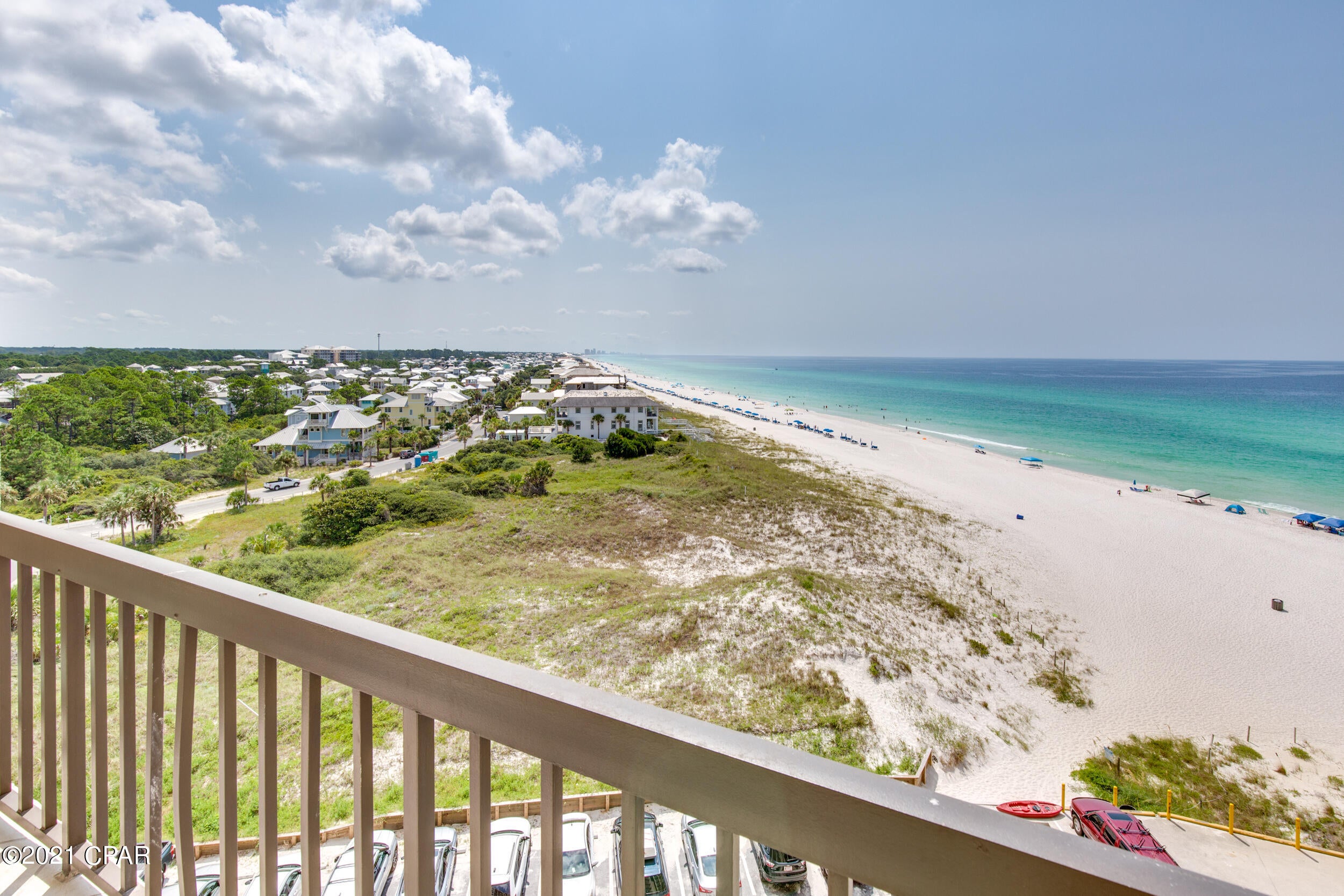 CURRENTLY UNDER CONTRACT, SELLER ACCEPTING BACKUP OFFERS' Stunning views from this beautiful 2 bedroom, 2.5 bath townhouse-style unit.  The living room and dining room and the first floor balcony have views of the Gulf and its beaches and coastline.  The kitchen is updated with light and bright white cabinets with  glass-front uppers, a tile backsplash and quartz countertops.   On the 2nd level is the master bedroom and bath.  The master has a private balcony with views of Lake Powell.  The guest bedroom features a wonderful view of the Gulf.  There is a hall bath for guests equipped with a large tiled shower.  Pinnacle Port Resort is situated on a 25+ acre site within a beautiful gated community having over 1/4 mile of beach frontage! The complex has lots of amenities including two swimming pools, tennis courts, sauna/steam room, fitness room.  free wi-fi, its own private freshwater dock with boat slips and boat launch.  Please note that the Association fees include electricity for heating, cooling and hot water.  The owner pays a small electricity bill for lighting and appliances only.