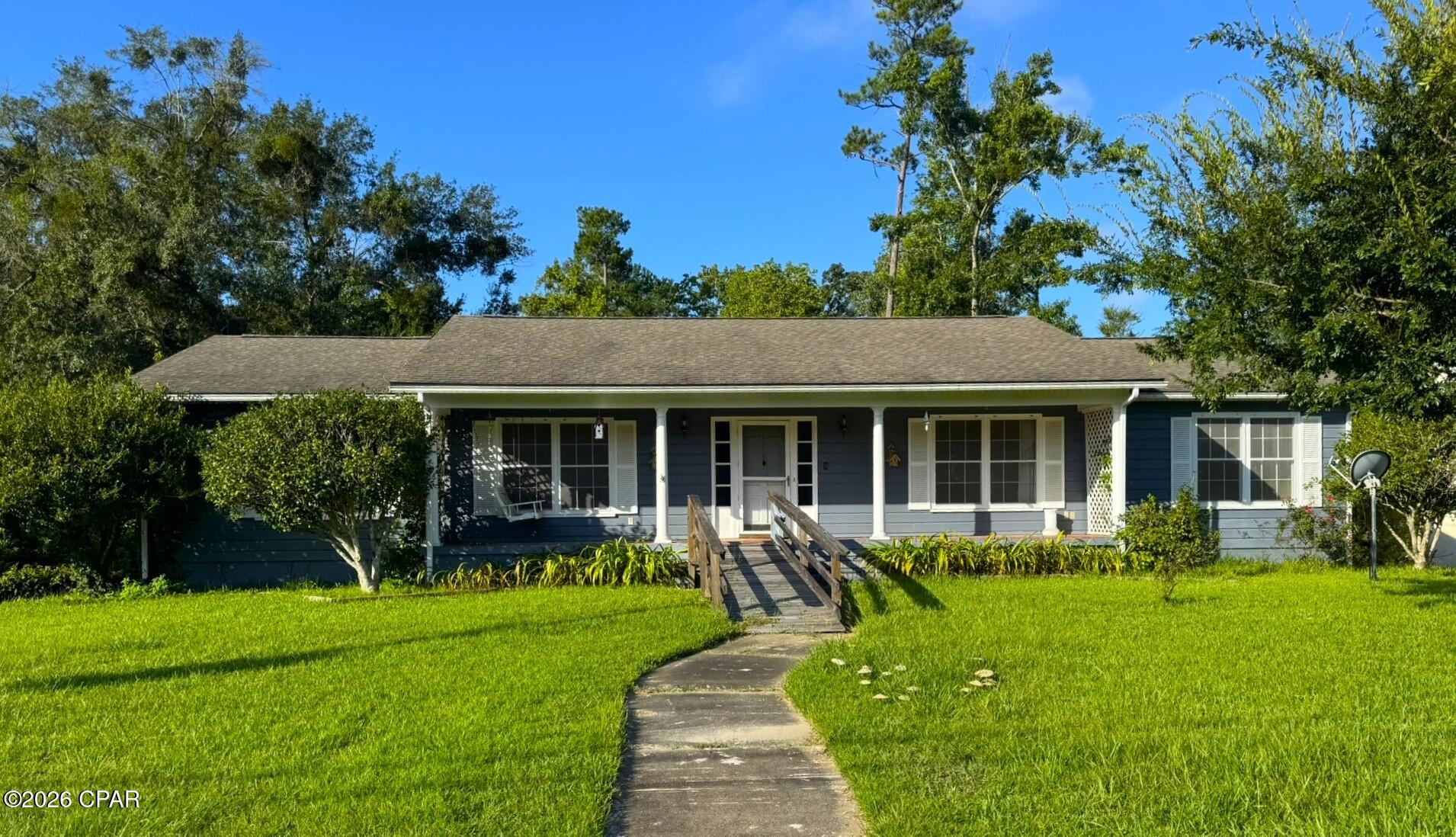 BIG HOUSE. BIG POTENTIAL. BIG OPPORTUNITY! If space is what you're looking for, this home delivers! With approximately 2,024 sq. ft., there's plenty of room to spread out, entertain, and make it your own. This three-bedroom, two-bath home features a formal living room, formal dining room, and a HUGE eat-in kitchen with an abundance of cabinet space. The primary bedroom includes its own en suite bath, and the oversized laundry room provides even more valuable space and storage.
Step outside to the 10 x 16 screened porch overlooking a beautiful green lawn with a peaceful wooded backdrop--a wonderful spot for morning coffee, relaxing evenings, or simply enjoying the outdoors. The property also features a two-car garage and a separate 24 x 10 basement, offering additional space for storage, a workshop, hobbies, or whatever fits your needs.
While much of the home is dated, that's where the opportunity comes in! With a little elbow grease, a can of paint, and some vision, you could begin BUILDING EQUITY and transforming this spacious home to reflect your own style.
Some of the big-ticket items have already been addressed: the roof was replaced near the end of 2018, and the HVAC system is only a couple of years old. Appliances include the oven, stovetop, refrigerator, and dishwasher.
And for those who love the outdoors, you're just minutes from Lake Seminole, a massive approximately 59-square-mile lake known for fishing, hunting, boating, and outdoor recreation. Lake Seminole connects with the Apalachicola River through the Jim Woodruff Lock and Dam, opening the door to even more opportunities to enjoy the waterways of the Florida Panhandle.
With generous square footage, multiple living and dining spaces, abundant storage, a screened porch, garage, basement, nearby access to Lake Seminole, and plenty of potential, this home gives you the space to work with and the opportunity to make it your own.