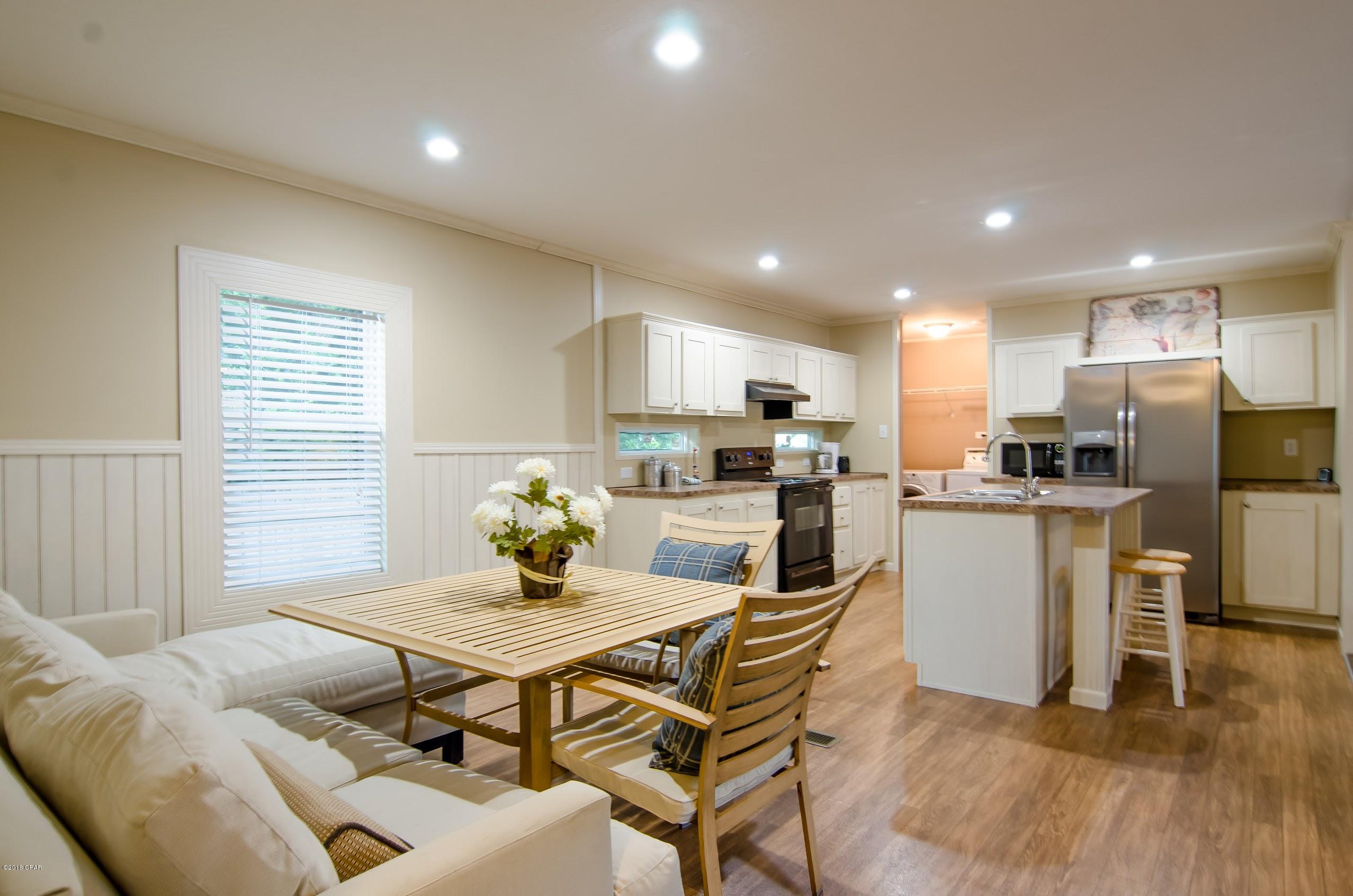Currently under contract, seller accepting back-up offers. FOUR MINUTE DRIVE TO THE WORLD'S MOST BEAUTIFUL BEACHES! (8 min to Pier Park, 10 min to 30A) SPLIT FLOOR PLAN! When you enter the home you will be greeted with an open living space that flows seamlessly into the kitchen. The kitchen features beautiful cabinetry, kitchen island with sink and a large breakfast nook. The LARGE living room is perfect for the whole family! On right side of the home you will find a large master bedroom & master bathroom. On the left side of the home you will find two spare bedrooms and a spare bathroom. Enjoy summer nights grilling out in your private backyard after spending the day relaxing on the beautiful white sandy beaches. All ages, sizes, and specifications are estimated and must be verifie