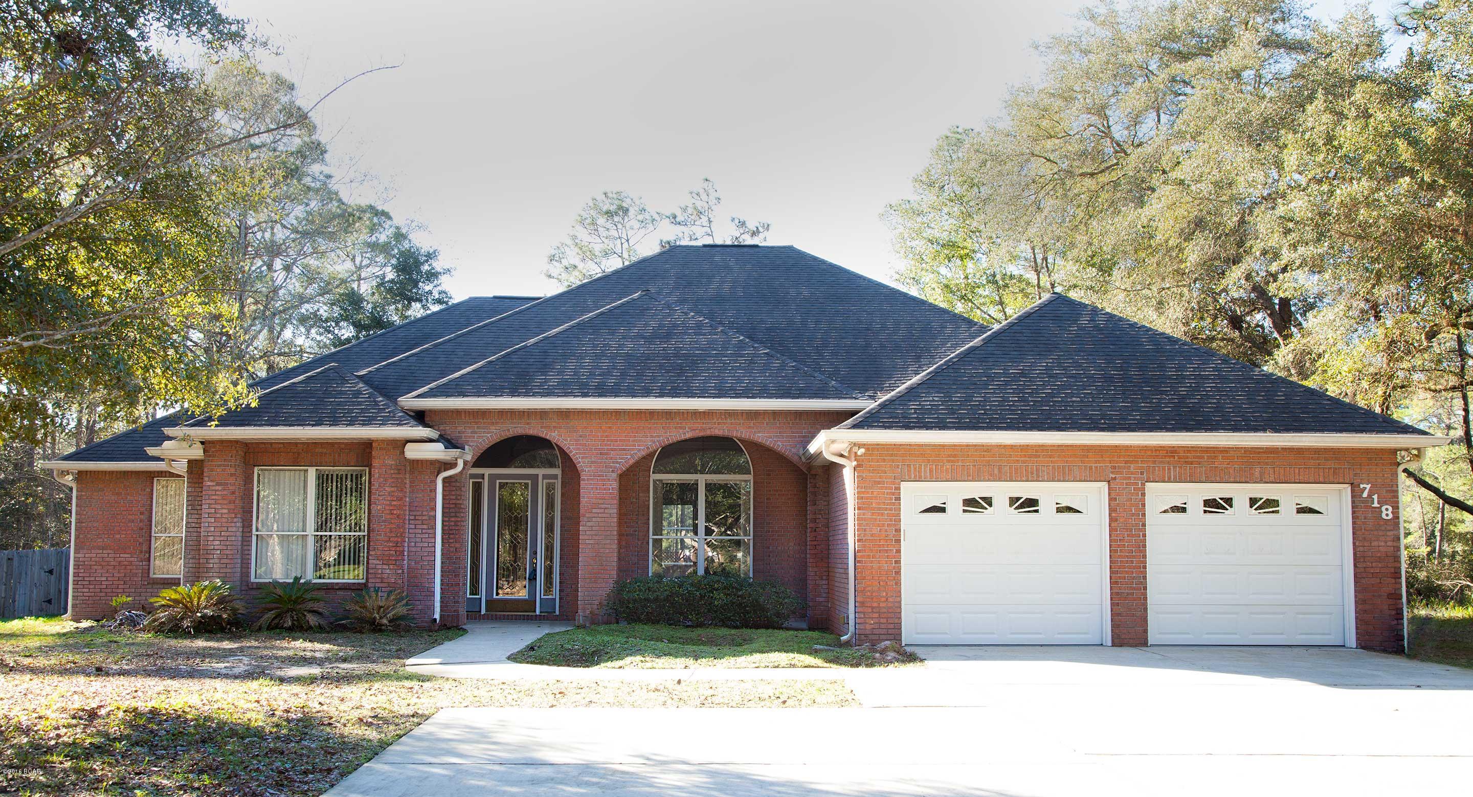 Exquisite custom built brick home featuring 10 to 12 ft ceilings and recently updated with new flooring and, a neutral interior paint. The great room has a gas fireplace surrounded with built in's for a TV. A gorgeous kitchen with cherry cabinets and granite counter tops. In the den you will find a cherry paneled accent wall, carpet accented by a marble border. The master suite has a spacious separate shower, Jacuzzi tub, double vanity with a corian counter and a large walk in closet. Enjoy the privacy of a large fenced in back yard while you lounge around the screened inground heated pool and spa.