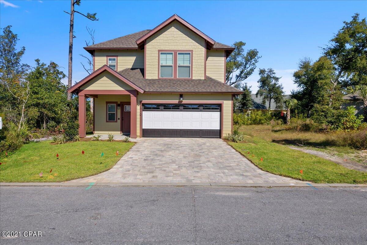 ***Brand new, absolutely GORGEOUS 3bd, 2.5 ba home in the exclusive(and gated) Sanctuary Beach community*** Home will be finished by years end. Builder spared no expense in upgrades to include: Vinyl plank and tile flooring, brick paver sidewalk and driveway, impact glass(150 mph rated) storm windows with blinds, foam insulated roof and walls, custom wood cabinets throughout, beautiful under mount Kohler farm sink, quartz countertops, stainless steel/black appliances, gas stove and tankless gas water heater, gas/electric dryer hook up, master bath tiled shower and floors(with glass shower door), and many other incredible features. Hurry, this one will not last long at this price. All information is approximate and should be verified by buyers if important
