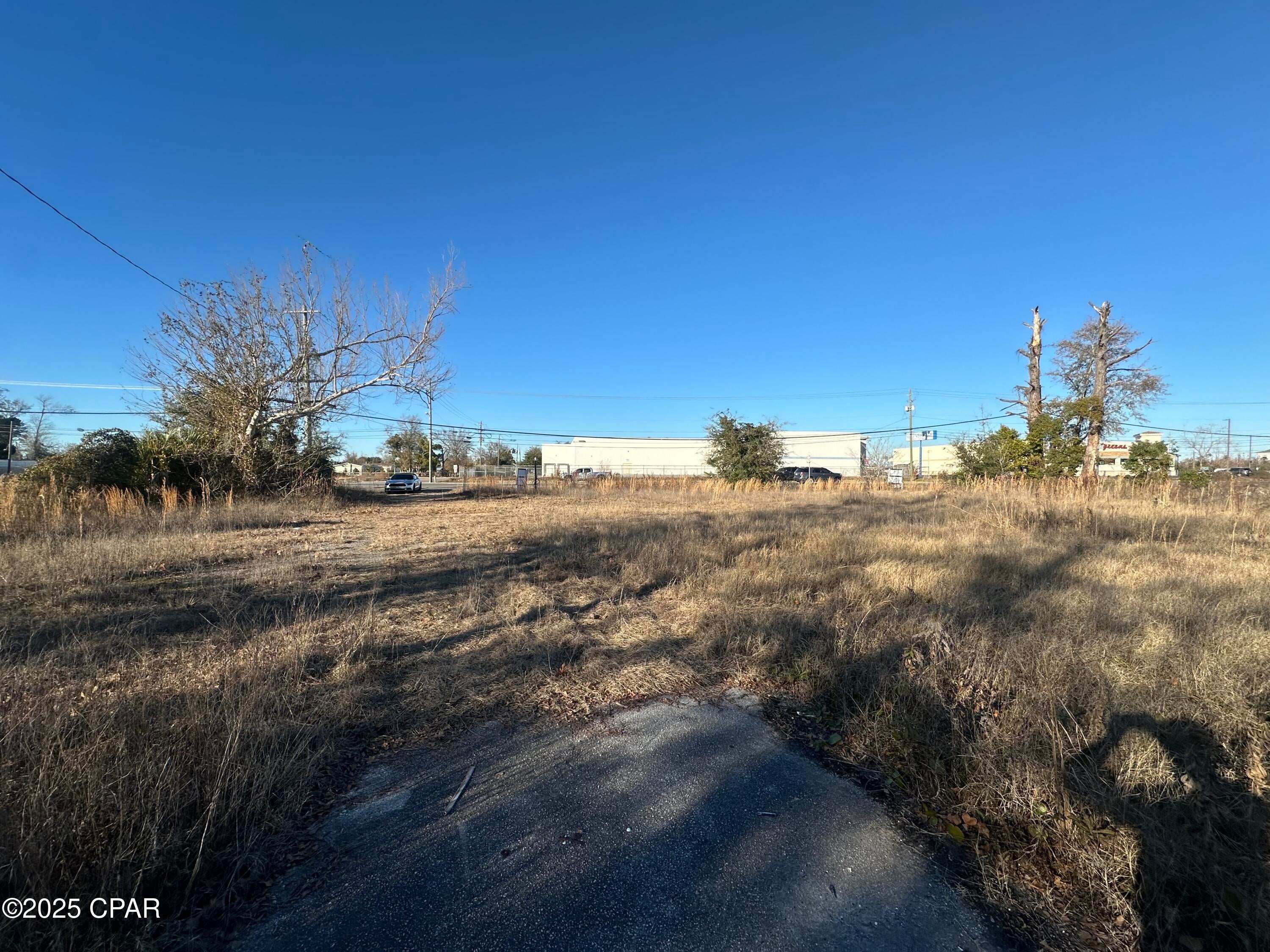 Prime commercial property located at the highly trafficked Highway 22 and 1,000 feet west of Tyndall Parkway (Highway 98).  Zoned Commercial within the City limits of Callaway. Great visibility and easy access. 2.68 acres of land. Central location. Potential uses include, but are not limited to, warehouse, office, service retail, hotel, etc.