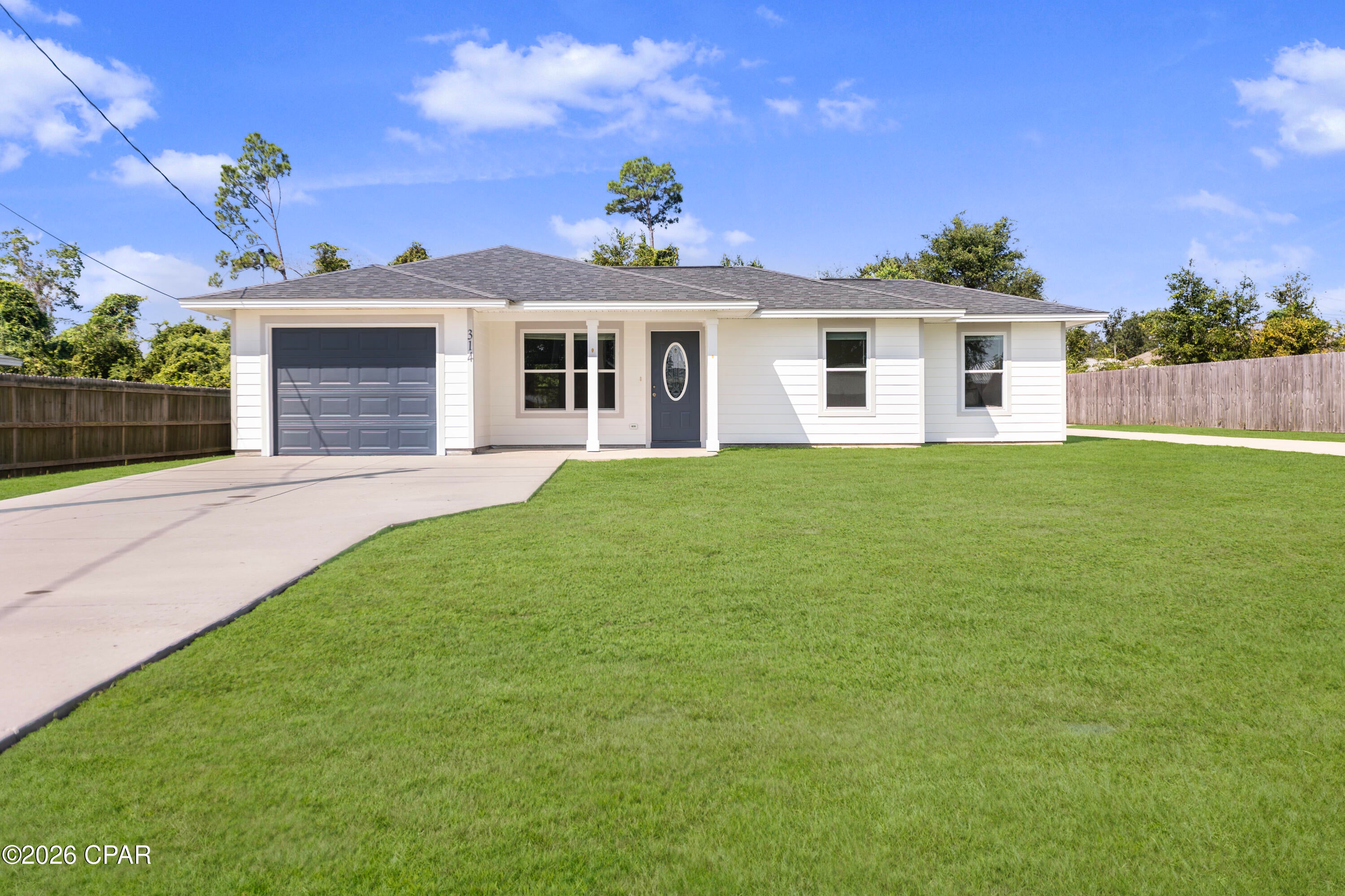 Welcome home to this beautiful well-maintained home situated on 0.3 acre! This 3-bedroom 2-bathroom home with vaulted ceiling features a kitchen with stainless and black appliances, a living and dining with French doors that lead to a concrete patio where you can enjoy the spacious backyard, and a 1 car garage. Upgrades done in 2020 include a new roof, new windows, new HVAC, and new water heater. There is also a separate metal garage building that has power with 9ft roll up doors and 10/12 ft ceilings that have foam insulation also a side door entrance, perfect as a workshop or can be converted to an office space, apartment, etc.  Conveniently located to schools, fine dining, shopping, and Tyndall AFB. Within 1/2 mile to Patterson Park and John B. Gore Park.