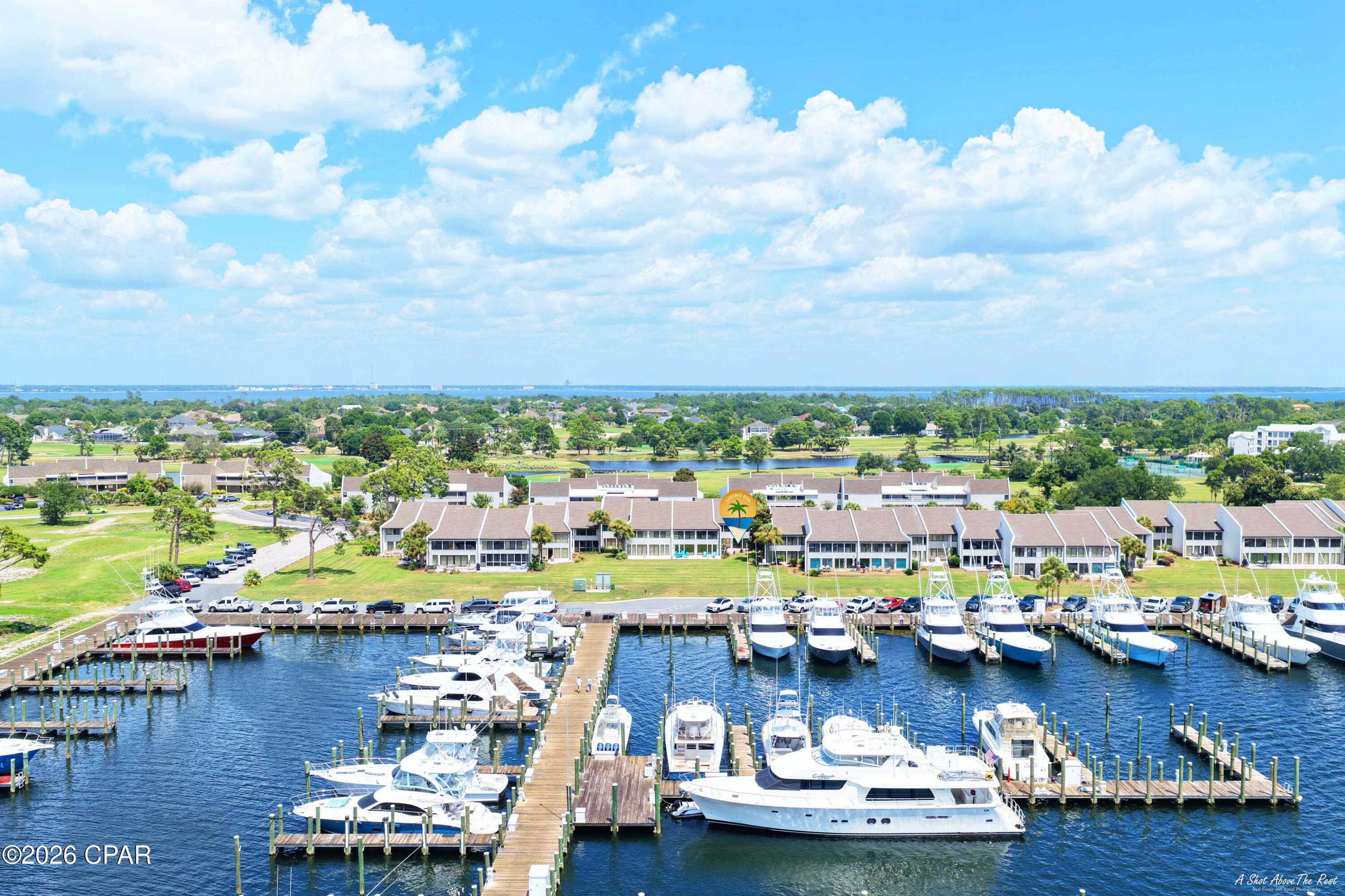 SELLER FINANCING AVAILABLE and $1,000 towards closing cost or prepays! Welcome to easy coastal living in this beautifully updated ground-floor Harbour Villa condo!  Enjoy overlooking the marina and living in the gated community of Bay Point.  This 1-bedroom, 1-bath residence has been completely renovated and feels just like new. Recent updates include a brand-new HVAC system, new appliances, quartz countertops in both the kitchen and bath, a stunning tiled walk-in shower, new lighting, ceiling fans, plank flooring, paver patio and more. The ground-floor location offers convenient access to single story living and makes this an ideal primary residence, second home, or investment property. Relax and enjoy marina views just steps from your door while taking advantage of all that Bay Point has to offer. Bay Point is a private, gated community with 24-hour security, a full-service marina, the Jack Nicklaus Signature Golf Course, dining, and a lifestyle centered around boating, golf, and coastal living. The Harbour Villas are perfectly located within the community, and short-term and long-term rentals are allowed, making this an excellent opportunity for both personal enjoyment and rental income. Seller financing available - call for details.