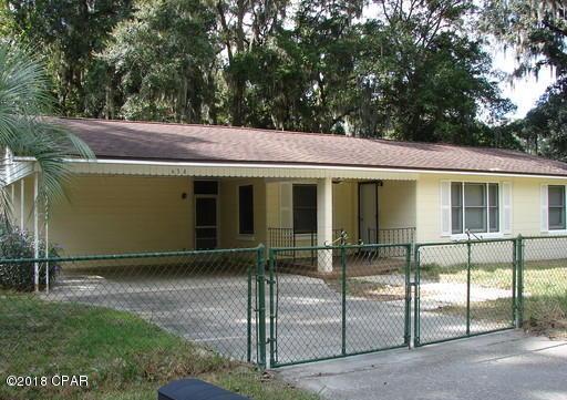 Single story homewithin minutes of Tyndall Air Force Base, shopping, and dining. There is a city park across the street and easy access to a small lake one block away. This home features a laundry room and second bathroom attached to the house under the two car carport. It also has an extra bonus room, with fireplace, that can be used as a 4th bedroom and a detached large shed with an electric roller door. The screened in area and large fenced in yard is perfect for enjoying the warm Florida summers. 



All measurements are approximate.
