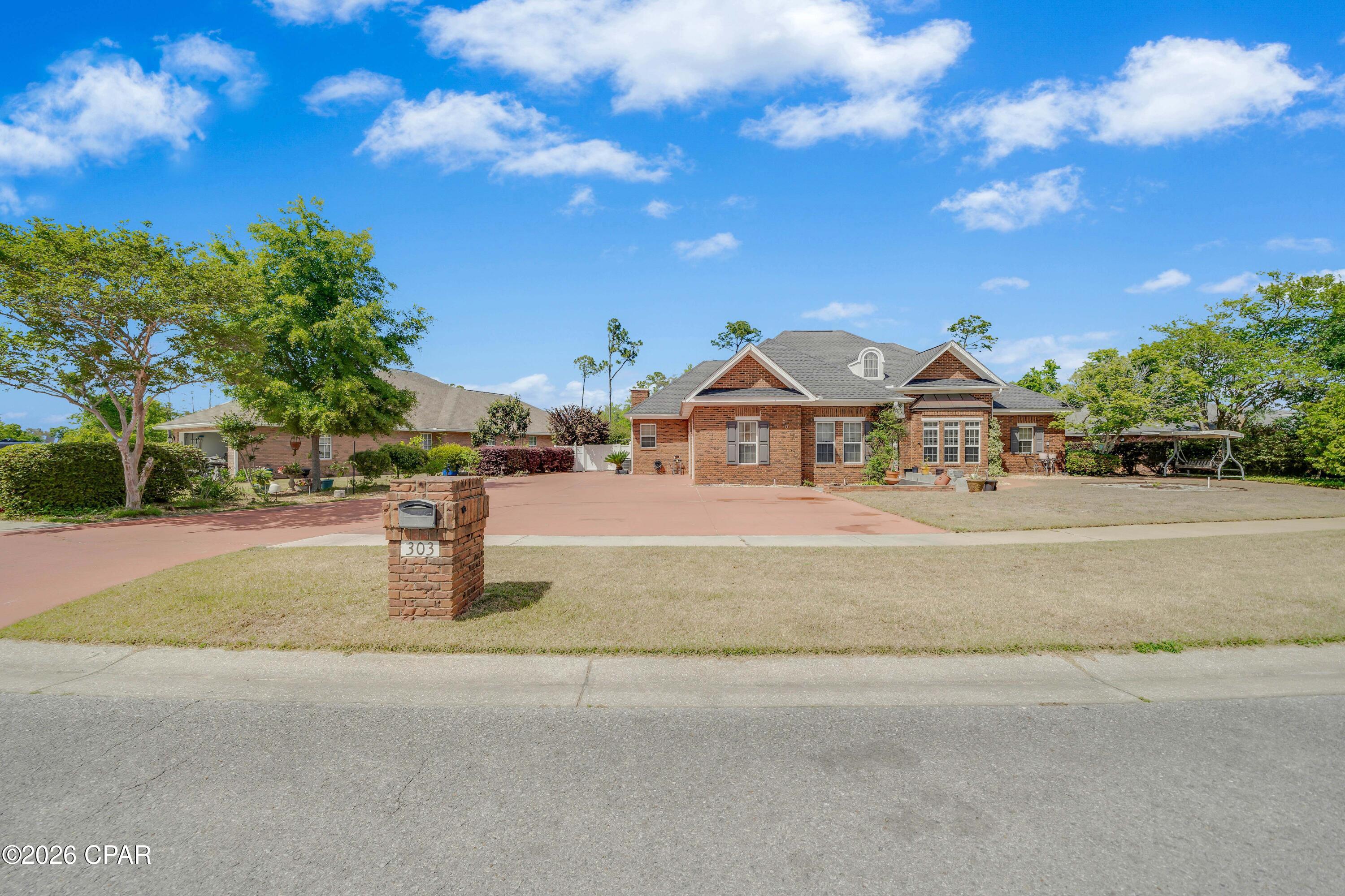 Home will not be available to rent for  60-90 days as owner is in the process of moving. Pets are welcome with a deposit.This home is absolutely gorgeous located in the popular subdivision of the Woods. Home has 2 living rooms. One off from the kitchen and one as you come in the front door. This home is tastefully decorated with stunning lighting and chandeliers. It also has an office and an extra sitting room. New roof in 2019. Back yard is a paradise for growing your own fruit. There are pear trees, peach trees, mulberry, cherry, kumquat, and persimmon trees. Very little yard to cut as pavers and extra concrete added. A perfect Lanai for grilling and sitting out side. This will not last long! Go a few blocks and you are on 23rd street for everything you will need. Wonderful neighborhood.