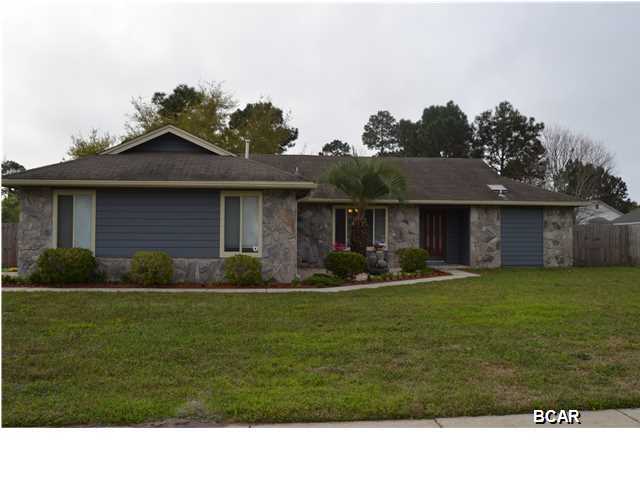 Completely renovated 3 bedroom, 2 bath home located in the popular Callaway Point neighborhood, just steps from the Bay. This home is situated on a huge corner lot with plenty of parking and additional boat parking behind the privacy fence. The interior of the home looks and feels like brand new with an amazing, high end kitchen with granite counters, stainless appliances, double convection oven, gas cooktop and a desk/study area. You won't find a finer kitchen in this price range. A breakfast bar separates the kitchen from the huge great room with a wood burning fireplace and stylish porcelain tile throughout. For formal dinners there is a dining room that is open to the great room. The master bedroom just received a makeover with new carpet, a custom vanity with granite top and a