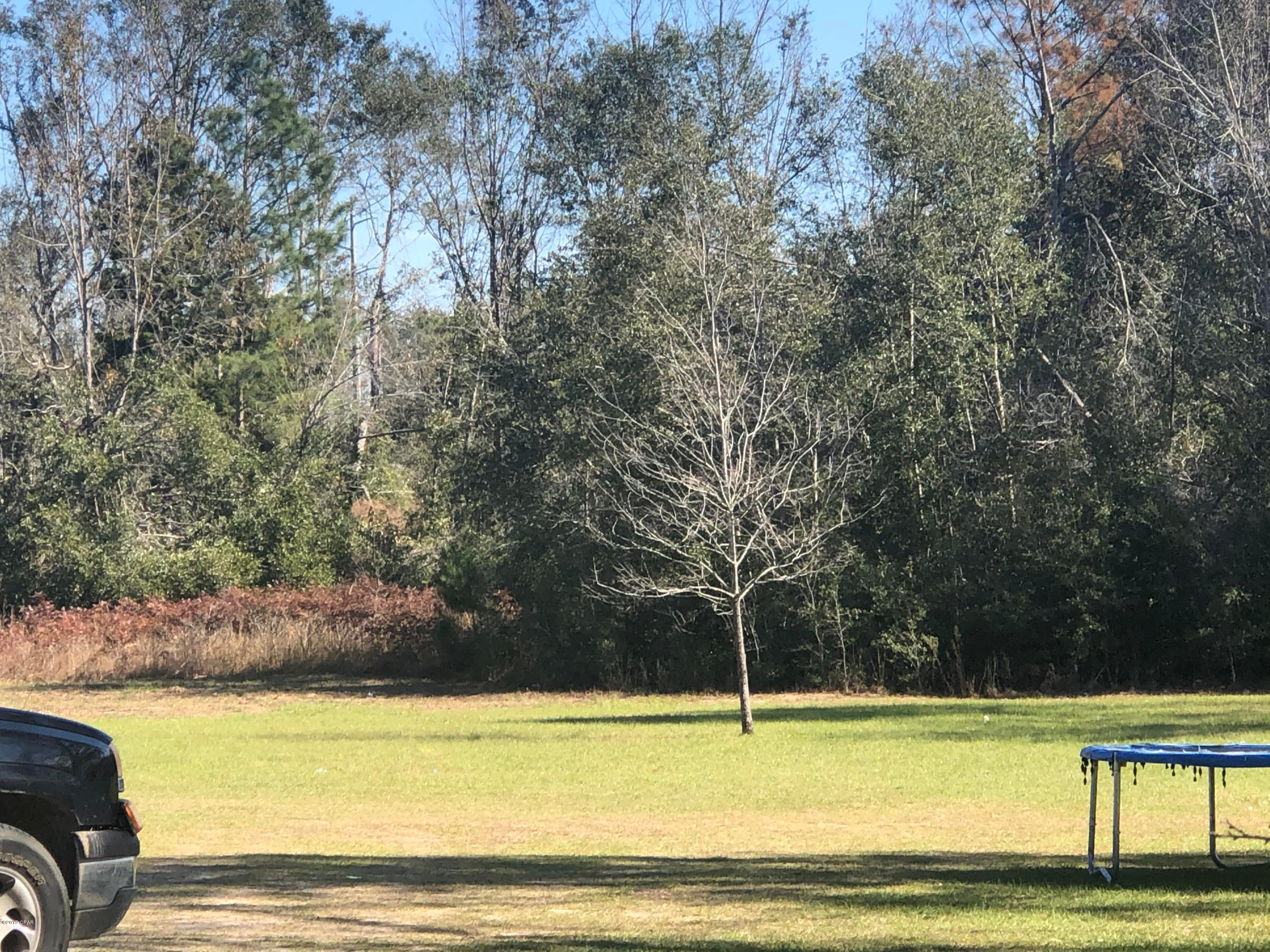 Country Living is awesome. Here 3.5 acres mol in the country not far out of Marianna.  Mobile homes Ok.  Seller say's at one point many years ago there was a well and septic and old house. Seller says he doesn't know if any are still there or if in workable condition.  Buyer to verify.