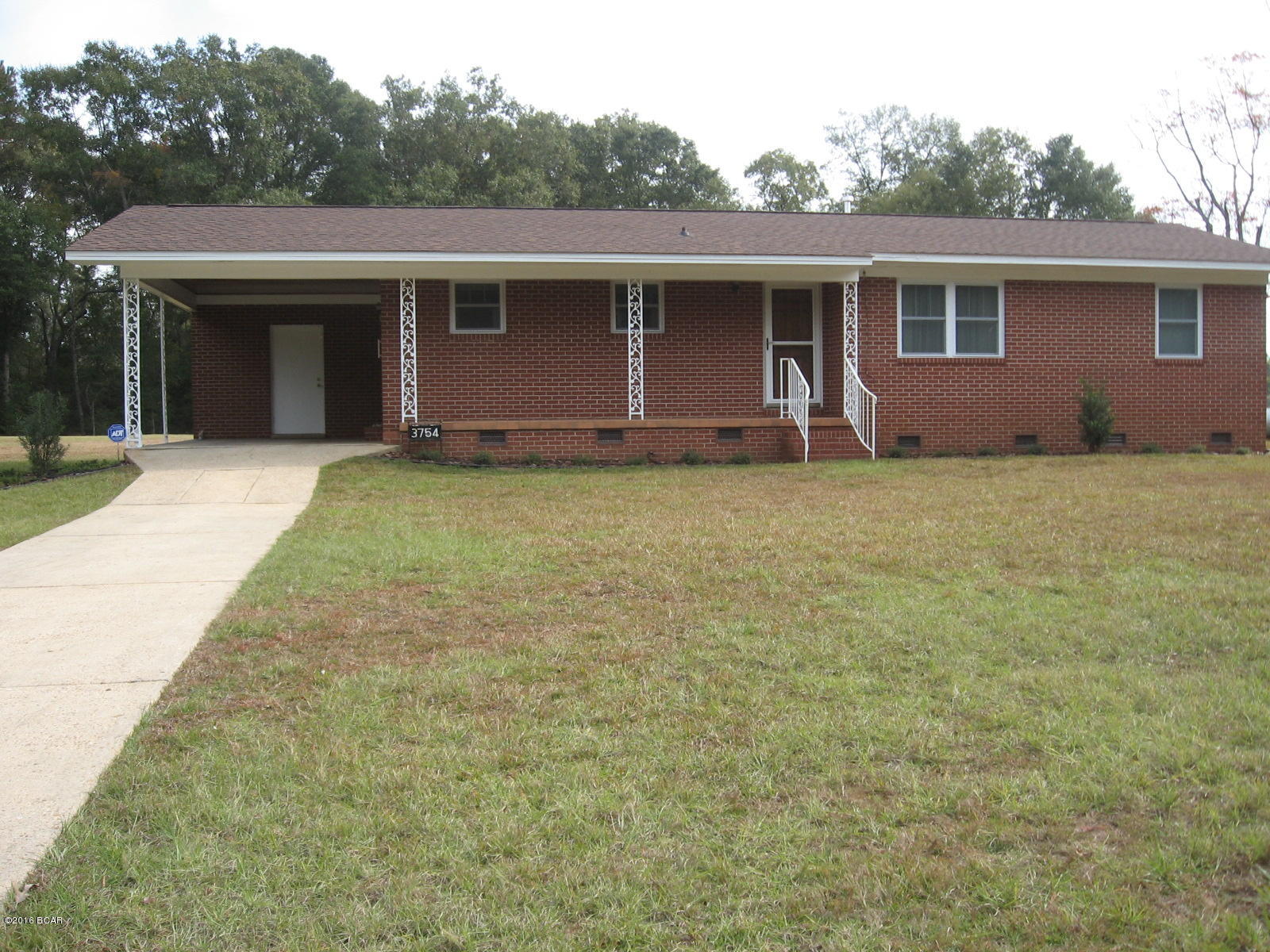 Lovely 3 Bedrooms, 1&1/2 Baths Ranch Brick Home on two acres located on paved road. Yard has split-rail wooden fencing in front and is chain-link fencing on both sides. Back side is wooded. New Shingle Roof in 2013 with Lifetime Architectural Atlas Pinnacle Shingles. Siding is all Brick with wood trim. Double Hung Double Paned Energy Star Qualified climate zone(s) US South-Central windows in 2013. Has Alarm System. Floor is 2.5 Select Oak, finished, filled and varnished. The oak floors are bow covered with carpet. Bathroom floors are ceramic title and the Kitchen has vinyl tile. Concrete Driveway to attached Carport. Has Termite Bond. Property Line goes further than tree line, survey is available. Has 15 Sear Dual Fuel System with Heat Pump that changes to gas with colder weather, Put in
