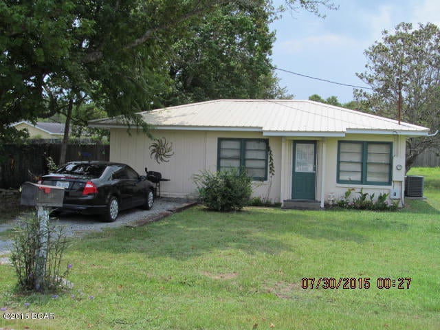 Cute Florida Block Cottage with original tongue and groove ceilings , close to Beach, Lake Powell, Shopping and all West End amenities. Enjoy beautiful Lake Powell fishing with boat launch and dock, boating or swimming. Stroll to the Gulf and enjoy our beautiful white sand and emerald waters. This location is awesome 30A is close by as well as Pier Park with shopping dining and entertainment. This cottage has newer floors and  kitchen. Roof, HVAC,  and water heater was replaced in 2011. Stove and Fridge was replaced in 2012. There is a bonus room that measures 9'X10' that could be used as a bunk room or office. The  perfect home for a first time buyer, retirement or beach get away!