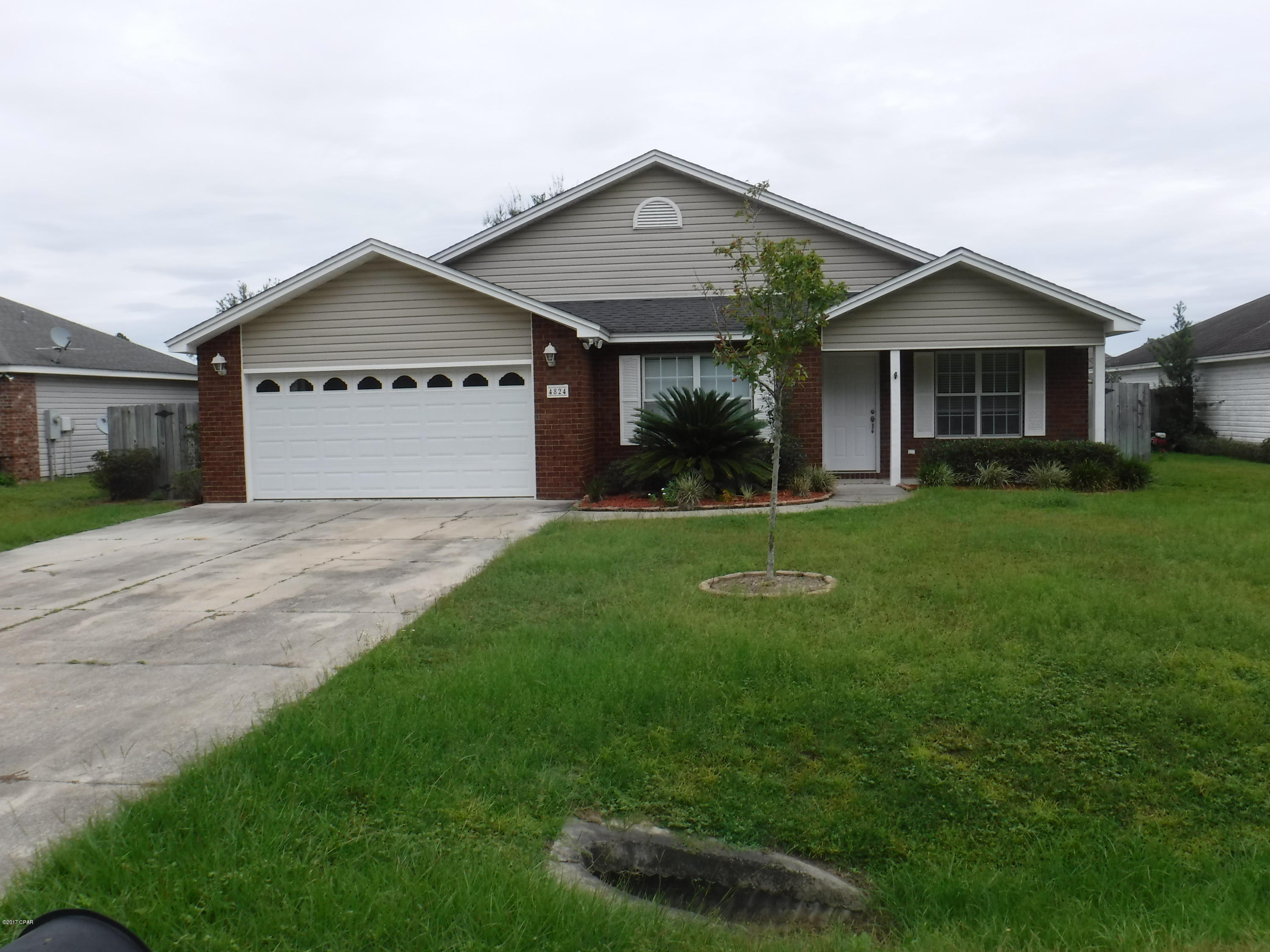 3/2 with many upgrades. Large tile in the foyer, dining, kitchen, utility, and bath. Backyard completely privacy fenced. Travertine tiled back splash in kitchen. Chair molding in dining room. Custom blinds throughout home.  All property sizes and ages are approximate, please measure and/or verify if important. School assignments are subject to change, please check with Bay County for most accurate information. Deposit is the same as the rent. Pets allowed with owner approval and non-refundable security deposit.