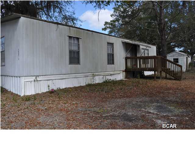 Great investment property! This is a double lot so you can rehab the trailer and build a rental home. While the mobile home is being given no value, the seller says with a little TLC and elbow grease, it could easily be rehabbed. Located in the heart of Callaway, you're just 5 minutes from Tyndall AFB, shopping centers, restaurants and schools. Property being sold AS-IS. All info is approx. and must be verified by Buyers if important.