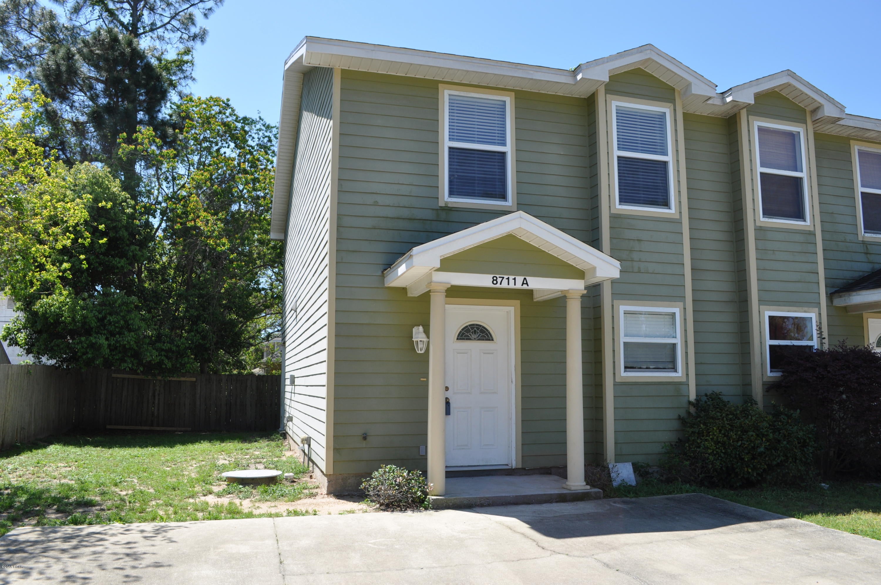 Best investment in Panama City Beach!  This 2BR/2.5BA townhome is move-in ready and has lots of great features such as 18'' ceramic tile, stainless steel appliances, tiled countertops, pantry, Hunter ceiling fans/light fixtures, lots of closets and pull-down attic stairs for extra storage.  The location is superb for college students or military as you're only 5 minutes from the Navy base and the FSU-PC and Gulf Coast College campuses.  You're also convenient to shopping and the beach!  Extra wide driveway and a covered back patio with a partially privacy fenced backyard.  All info is approx. and must be verified by Buyers if important.
