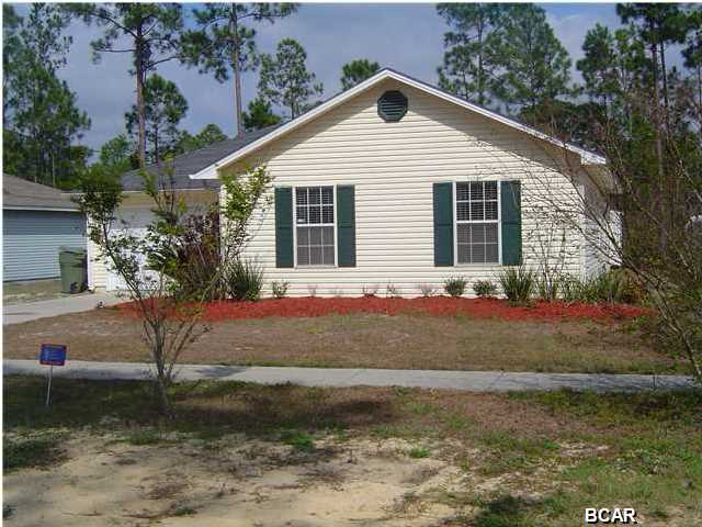 3 bedrooms, 2 bath home centrally located in Lynn Haven, features a split bedroom plan for privacy. Large master bedroom features his & her closets. Master bath has ceramic tile with separate walk in shower. Open living room with laminate wood flooring. Kitchen has ceramic tile flooring, plenty of storage space, equipped with stainless steel refrigerator, dishwasher, electric stove & oven. Separate dining area adjacent to the kitchen with French doors that open up to privacy fenced in back yard. Bonus shed located in the back yard for extra storage. Stackable washer/dryer located in the garage. Pets are negotiable with a non-refundable $150.00 per animal fee.