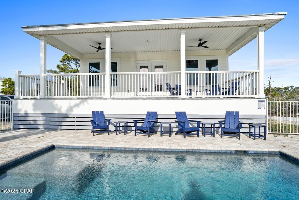 Take a slow down to ''three quarter time'' in this beautiful recent construction (2021) only steps away from the emerald colored waters of the Gulf of Mexico NO HOA. Take a dip in the newly added in-ground private swimming pool, with pavers surrounding, and fenced in. Take in the ocean breeze on the sizable covered front porch lounging area. Then, take a step inside to the main living and dining areas which are open concept with vaulted ceilings. Move down the hallway to find three bedrooms, a mermaid tiled shower, and master bathroom. Quality is the word that comes to mind when you see the tile working in the bathrooms and trimmings throughout the home. Truly an oasis on the highly sought after area of North Cape San Blas, where the water is clear and the sand is white as snow. Sandy? No issue, there is also an enclosed outdoor shower conveniently located by the pool and front porch. The property makes for a fantastic short term rental, second, or primary residence as Swirly Sun Dr is a peaceful area with little to no traffic. Step away from the chaos and find your three quarter time in Cape San Blas, Florida.