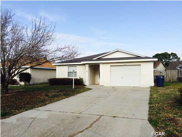 Great 3 bedroom 2 bath home located in Venetian Villa Community close to both Panama City, Lynn Haven and the 23rd St corridor. This home features an open living room, dining room and kitchen with laminate hardwood floors in all areas except the master bedroom with carpet and the kitchen and the bathrooms with tile. It also features a one car garage with opener, and a fenced back yard with covered patio.