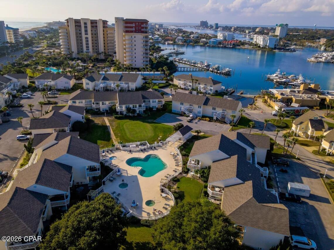 Renovated 1-bedroom condo in a peaceful setting with mature landscaping, golf, and pool views. Enjoy peak harbor views from the front balcony and the bedroom window. The living area boasts large windows overlooking the ninth fairway. The dining area has sliding doors to the private balcony with pool views far enough away to still feel private. The kitchen features updated granite countertops, a breakfast bar, and modern appliances. This furnished turnkey vacation rental is ready for you! Call to book your tour today!