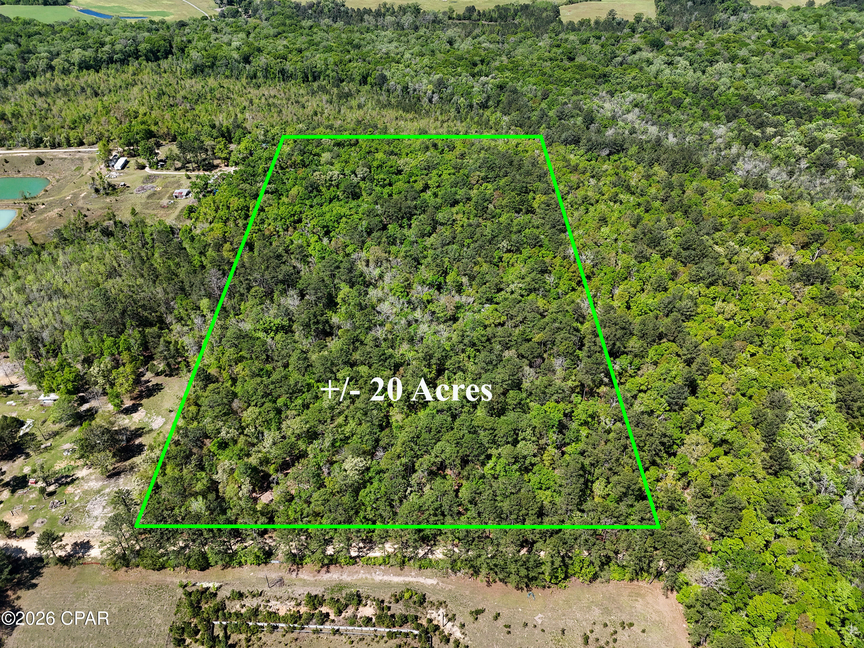 Stunning 20+/- Acre Tract in Northern Holmes County. This type of tract doesn't come around often. Flowing with mature timber and hardwoods, this tract is ideal for the person to wants recreational peace and an abundance of privacy. 

With a location that sits an hour North of Panama City Beach, and an hour from Beaches International Airport, this tract offers not only the convenience of peace, but also proximity to Gulf Front leisure play and travel. 

This one will not last long, so schedule your showing today!