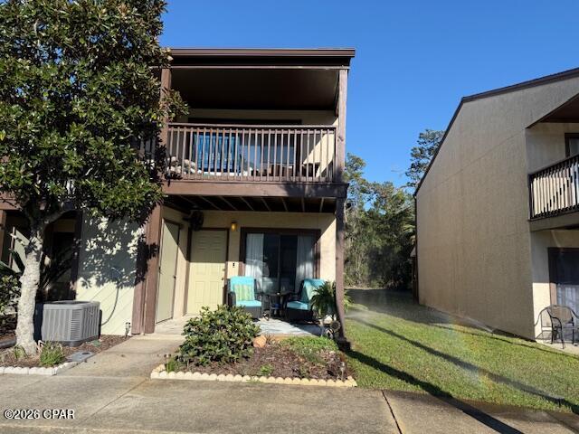 Welcome to Portside Resort on the desirable west end of Panama City Beach. Master with full bath, hall bath and half bath on first floor. This two-story, two and a half bath condo offers a spacious layout with the privacy of a townhome and all the conveniences of a beachside community. The open main living area features comfortable gathering space, a well-appointed kitchen, and access to a private patio--perfect for relaxing after a day on the beach. Upstairs you'll find generously sized bedrooms providing peaceful retreats for family and guests. Portside Resort is known for its beautifully maintained grounds and excellent amenities including multiple swimming pools, tennis courts, clubhouse, and easy beach access just across the street. Whether you're looking for a primary residence, vacation getaway, or income-producing short term rental.