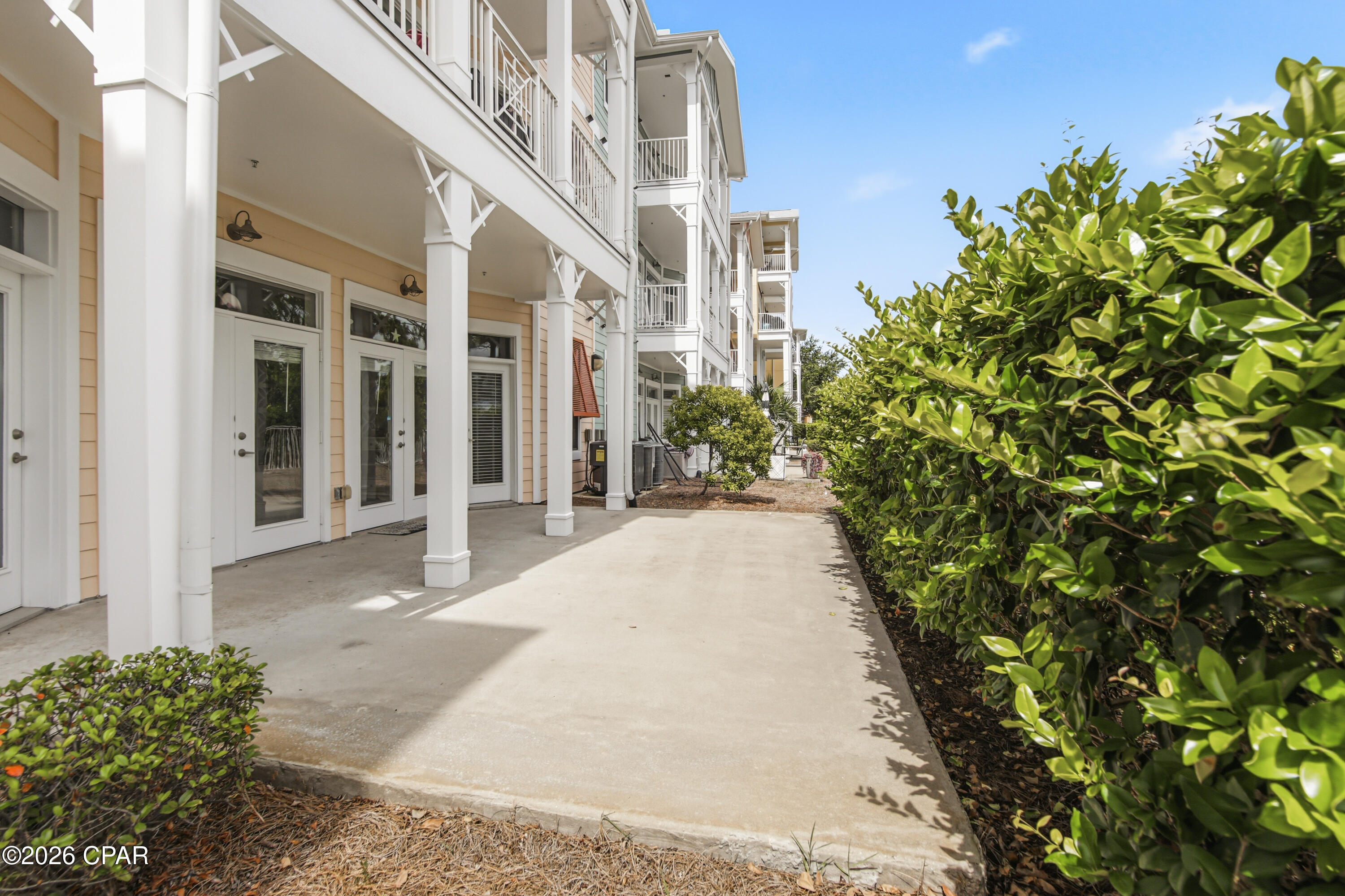 CURRENTLY UNDER CONTRACT, SELLER WILL CONSIDER BACKUP OFFERS.This beautiful  Island Reserve ground floor unit has so many wonderful features such as an open floor plan, 2 master suites, high ceilings  & granite countertops.One of the few units with convenient covered parking connecting to the building. The Resort of Island Reserve is remarkable! This Gated community has wonderful amenities including a gorgeous one acre, resort style lagoon pool with rock waterfall, state of the art fitness facility, billiard & game room, Media Center with 100'' Theater Scree & an indoor pickle ballcourt, The Parking garage has Direct Access to each floor. This is a brilliant location close to shopping  and only 1.4 miles to the beautiful gulf and sandy white beaches.