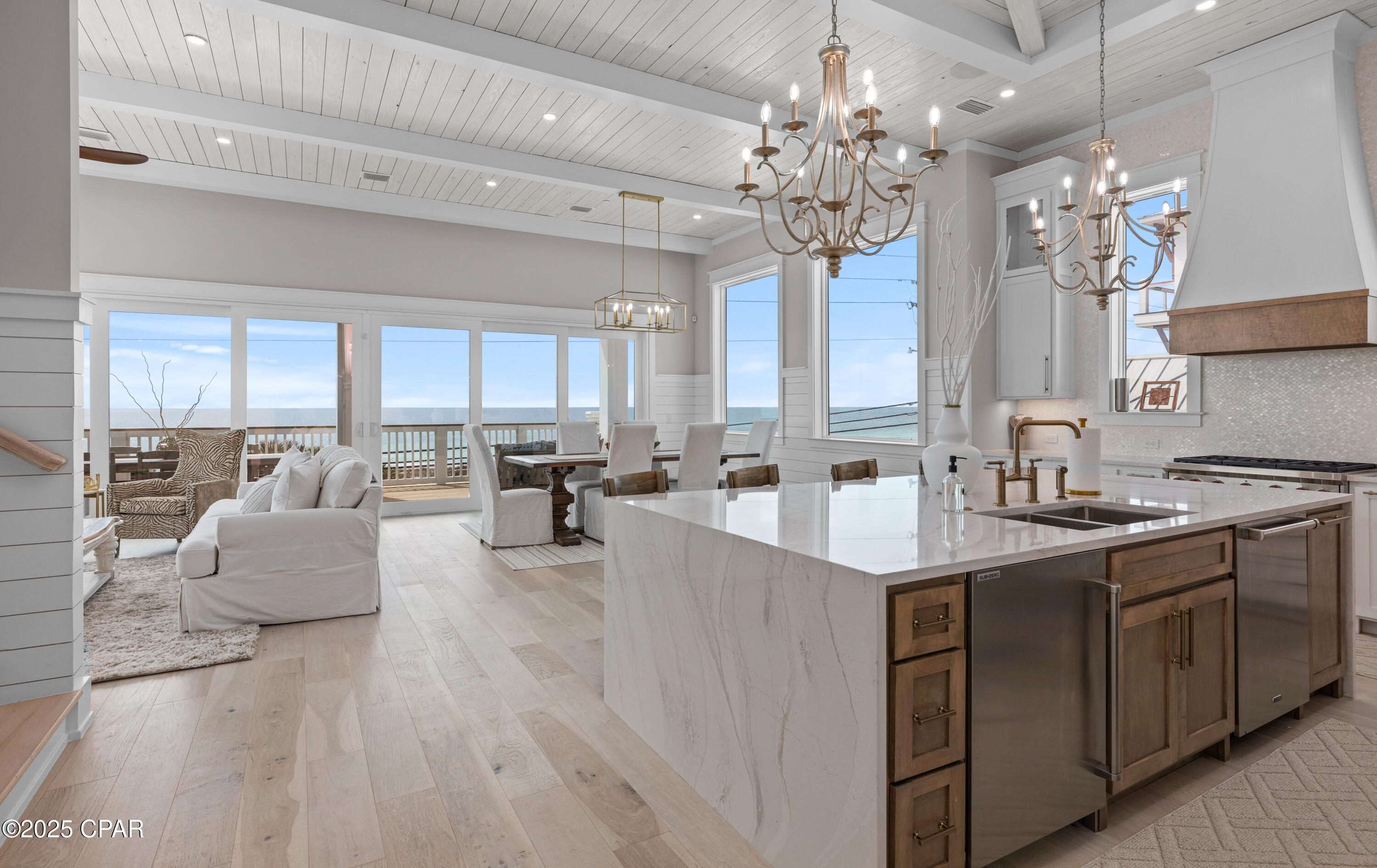 Welcome to 19006 Front Beach Road, a masterpiece of modern coastal luxury. Nestled along the pristine shores of Panama City Beach Fl, this 7 bed, 7 1/2  bath estate offers breathtaking panoramic ocean views, direct beach access, and unparalleled craftsmanship.

The state-of-the-art gourmet kitchen is a chef equipped with top-of-the-line Wolf & Sub-Zero appliances, custom cabinetry, and an oversized island perfect for hosting. The primary suite is a private sanctuary, boasting a spa-inspired en-suite bath, a spacious walk-in closet, and a private balcony with uninterrupted ocean views.

Outdoor luxury abounds with a resort-style pool, spa, and multiple lounging areas. A private beachside fire pit, outdoor kitchen, elevating this estate to a level of true exclusivity.

Located on the prestigious Laguna Beach, this home is just moments from world-class dining, boutique shopping, golf courses. Whether you seek a serene retreat or a show-stopping entertaining space, this estate offers the pinnacle of beachfront living.