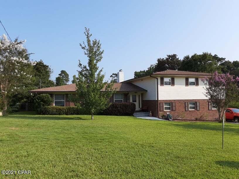 Scenic Hills Country Club, 1st Fairway, Golf Course Home, on a large lot with so many recent updates!  If you are looking for a large home, look no further, this home is for you. The roof was replaced in July 2021, 2 HVAC Units 5/2019, Water Heater 5/2019, Fence in 2021, and so much more.  If you like to entertain, this is the home for you.  The lower level features a Bonus room, with a wet bar, private entrance, and new Epoxy floors for easy maintenance.  There is also a 5th bedroom, with a private entrance, featuring its own private bath, large walk-in closet, which would be perfect for an In-Law Suite.  This split-level design features a wonderful floor plan with all bedrooms upstairs, including the master bedroom & master bath, and another full bathroom.  The main living quarters feature a den, with a step-up to a dining room, both with wood floors, plus a separate living room, with a wood burning fireplace, French doors leading to the enchanting backyard, and a "Bakers Dream" Kitchen with so much space.  Cabinets, more Cabinets, and Decorative glass cabinets, along with granite countertops, stainless steel appliances to include a built-in microwave & stove, drop-in cooktop, and dishwasher.  There is plenty of counter space and the current owner even has a coffee stations setup, next to the breakfast area, which overlooks the backyard and fairway through the beautiful bay window.  The backyard is where you will go to relax your day away... The pergola covered patio has just the right amount of shading and has more than enough room for all your furniture.  The yard has lush landscaping, and you can see the amount of pride the owners have in taking care of it. The yard is fenced for added privacy, and the doors and windows have hurricane shutters to help reduce your insurance cost.  With the 2-car garage, and extended driveway, you will have more than enough room for all your vehicles. Sellers are offering an Old Republic Home Warranty valued at $470, for added peace of mind, and the sellers have a termite bond in place with Florida Pest.  There is so much more I can say about this home, but you must view it to appreciate all the wonderful extras it has. Contact your Relator today for a private showing.  Age, Sq.Ft., Room Dimensions, Schools, Taxes, or any important information must be verified by buyer via professional inspection or personal due diligence.