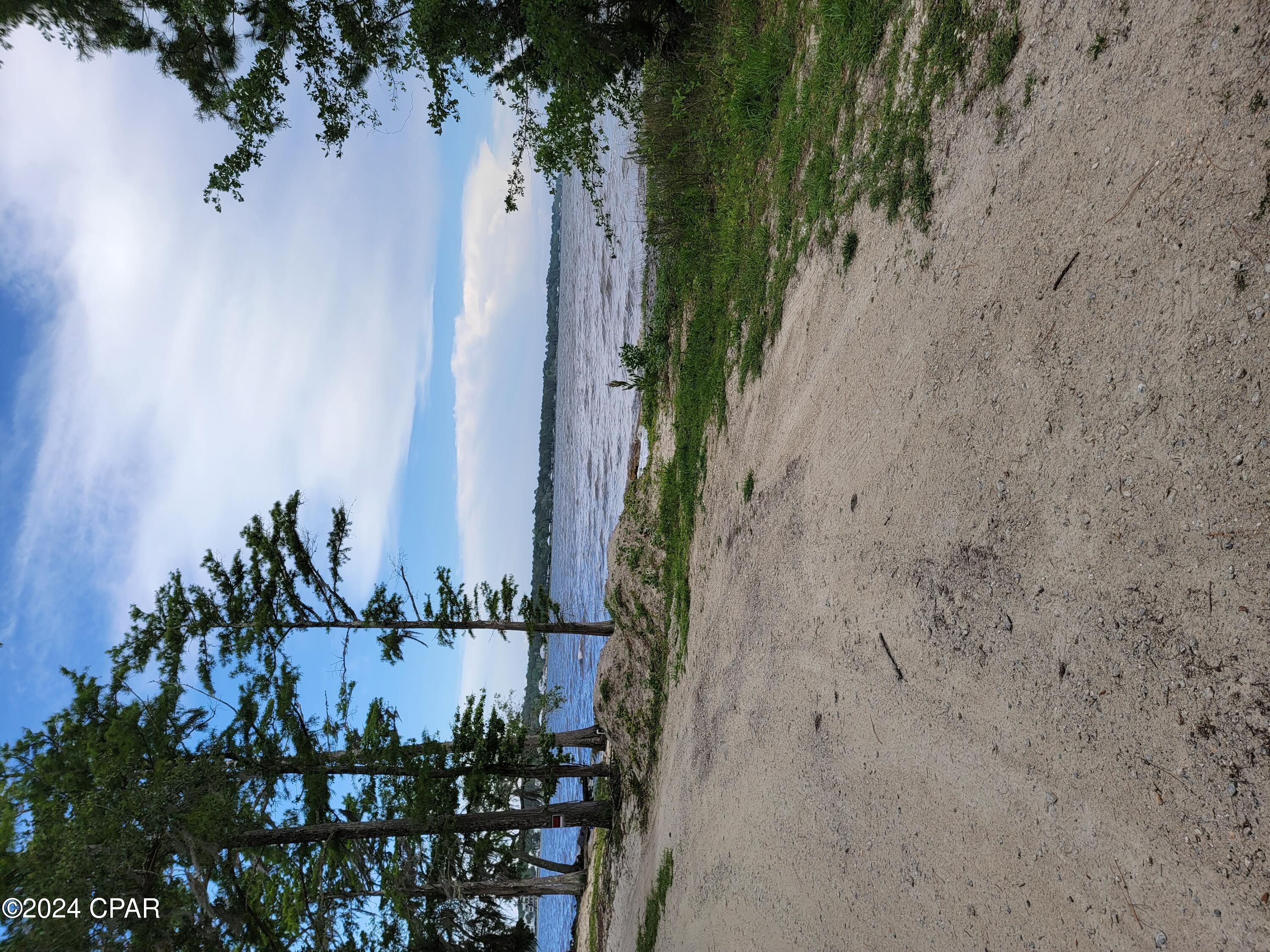 Lowest Priced, TRUE BAYFRONT, .35 +/- Acre Lot, anywhere in the area!!! This Beautiful Large Bay Front Lot has absolutely stunning views perfect for your New Home or Vacation Home! Million-dollar views at a fraction of the price and is close to the highly popular area of Santa Rosa Beach and all things fun!! You are just 20-30 minutes from anywhere you want or need to go! There is NO Association or Association Fees. This is a rare find in this market and will sell fast!! Great area, close to the beach, all the attractions of 30-A, Destin, Panama City Beach, and airports, yet private and quiet away from the traffic and hustle/bustle! Survey available upon request. Must see, as it is exquisite!