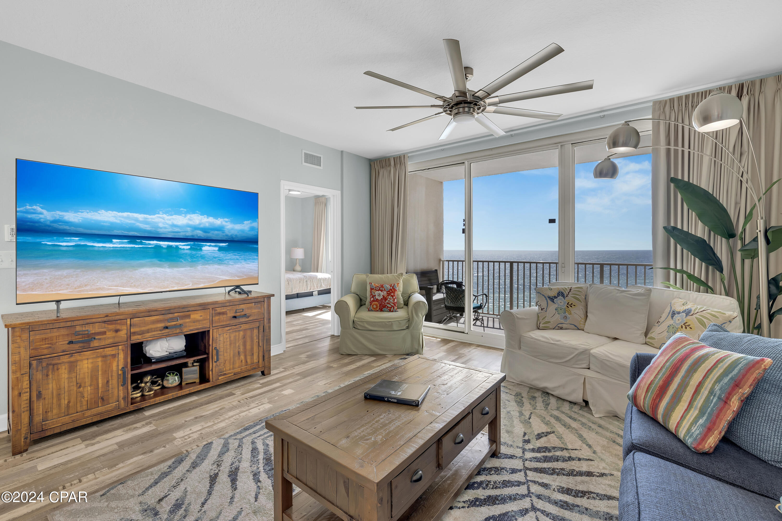 SELLER FINANCING OPTION AVAILABLE | GULF-VIEW J FLOOR PLAN. DEEDED PARKING NEAR THE BREEZEWAY. UPDATED 2-BEDROOM PLUS BUNK LAYOUT.

Shores of Panama Unit 1118 offers a highly functional 2-bedroom plus bunk area layout with 2.5 bathrooms, in-unit laundry, and a deeded parking space located just three spaces from the breezeway. This placement creates a more convenient arrival experience for parking, unloading, and accessing the elevators.

Positioned in the desirable ''J'' floor plan, Unit 1118 places the primary bedroom on the Gulf side of the condo, allowing natural light and Gulf-facing views from the bedroom windows. The private balcony captures direct views of the lagoon-style pool, sunset skies, and the turquoise waters of the Gulf of Mexico in Panama City Beach, Florida.

Inside, the condo reflects thoughtful ownership and tasteful updates throughout. Features include LVP flooring, updated lighting fixtures, framed mirrors, Samsung stainless steel appliances known for quiet operation, a large industrial-style sink added in 2022, and updated furnishings. Entertainment upgrades include a new 65-inch flat-screen TV in the living area and new 55-inch flat-screen TVs in each bedroom. 

Additional ownership-focused improvements include a smart thermostat designed to shut off the HVAC system if doors remain open for an extended period, along with a 24/7 dehumidifier to help protect the unit and manage interior moisture levels.

Shores of Panama Resort is known for its expansive Gulf-front lagoon pool, one of the largest in Panama City Beach. The resort-style pool area features zero-entry access, palm-lined islands, fountains, a spacious hot tub, and direct private beachfront access. Additional amenities include an indoor heated pool and hot tub, 24-hour fitness center, and seasonal poolside Tiki bar. 

Located in the heart of Panama City Beach, Shores of Panama places dining, shopping, and entertainment nearby. Pineapple Willy's is adjacent to the resort, while Laketown Wharf directly across the street offers several dining, retail, and entertainment options, including Wharf Seafood Buffet, The Candymaker Ice Cream Shop, PCB Pizza, In Cahoots, The Press, The Bun Lab, 810 Billiards & Bowling, salon services, and more. Panama City Beach has also welcomed several newer attractions and entertainment venues, including Dolly Parton's Pirates Voyage Dinner & Show, Topgolf, McGuire's Irish Pub, and Tootsie's Orchid Lounge. 

HOA dues are $4,119.22 per quarter. All information is believed to be accurate but should be verified by buyers if important.