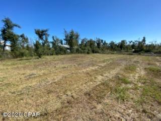 This is a great lot for building a new home, or adding a mobile home. There is a canal at the rear of the lot which connects to Deer Point Lake, and separates the lot from having any other homes too near. Just a short distance to be in Deer Point Lake where you can find great fishing, and enjoy many water activities. The waterway is navigable by small boat, kayak or stand up paddle board.