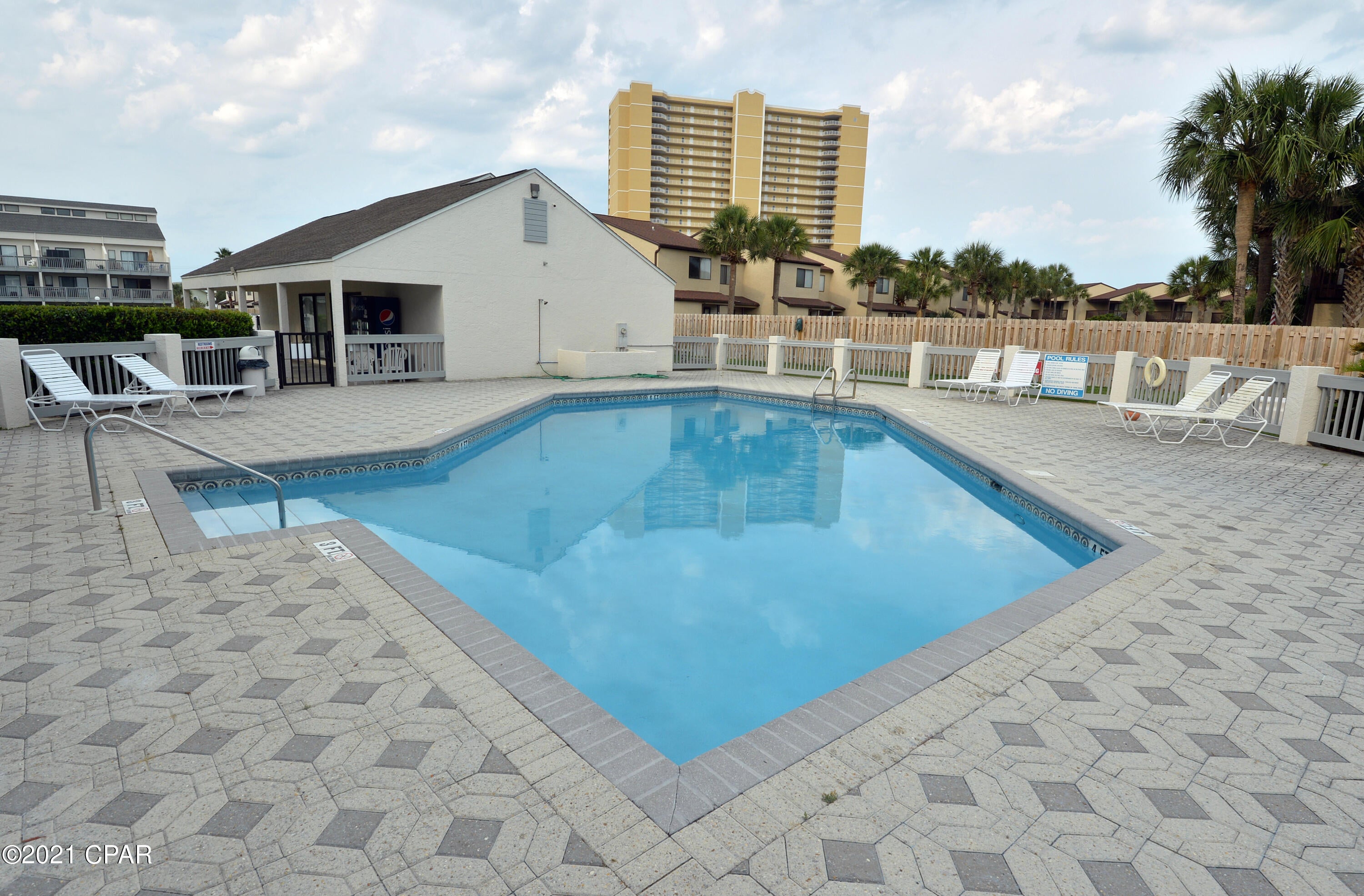 : Location! Location! Don't miss out on this great unit! This unit is a non-rental and is across the street from some of the most beautiful beaches in the world on the west end of PCB. This unit is well maintained and has been beautifully decorated. The bedroom is a great size with plenty of closet space. This unit has a washer and dryer. A ground level unit ready for you to make it your own. AC and Water Heater install 2020, New flooring 2021.