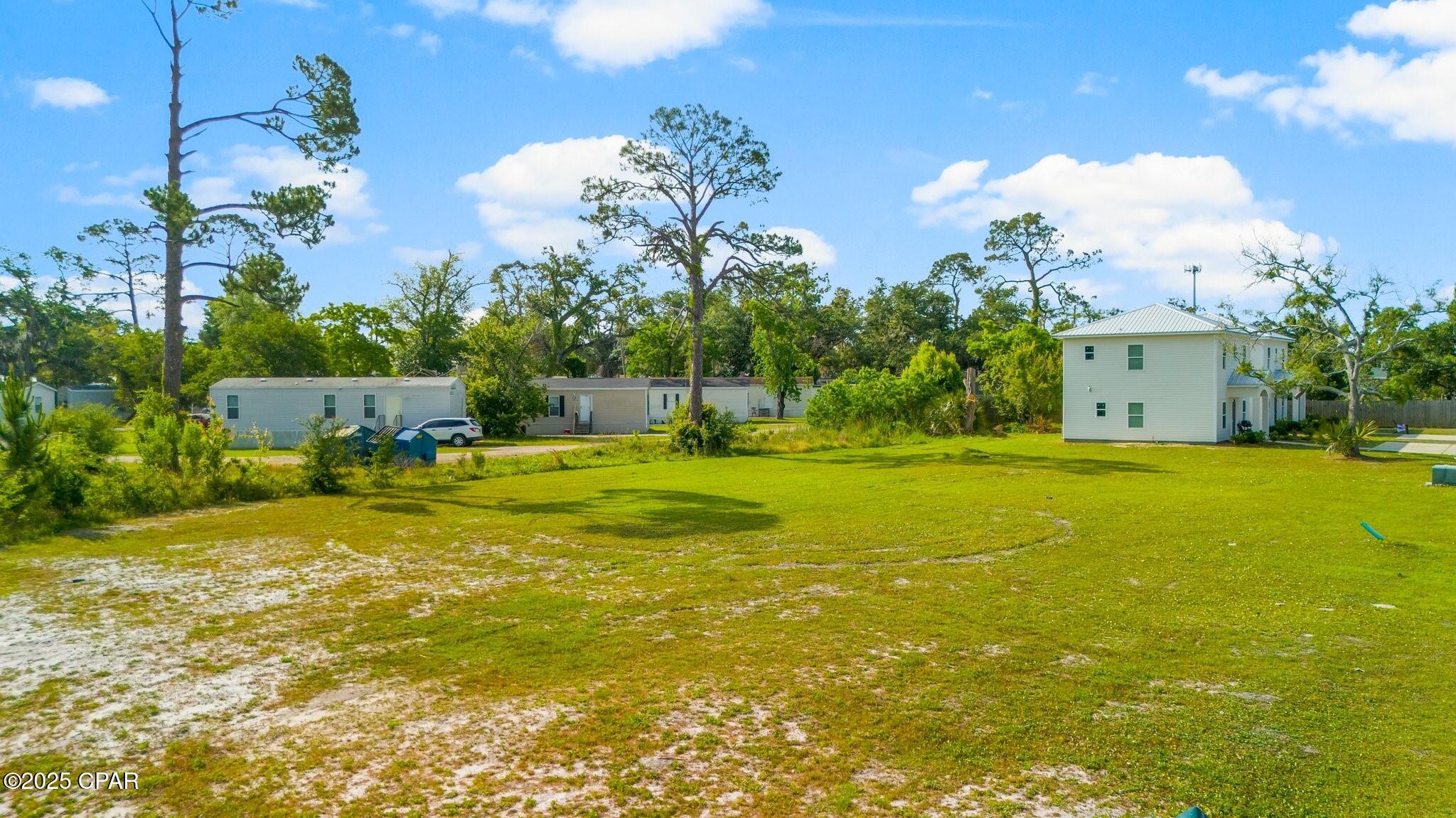 Calling all builders and investors! This prime piece of land is ideally situated near shopping, a city park, restaurants, colleges, schools, and just minutes from ''The World's Most Beautiful Beaches'' that make this area famous. Located in the coveted St. Andrews neighborhood, and conveniently close to FSU and Gulf Coast State College, this cleared lot offers limitless potential. Whether you're looking to build your dream home or expand your investment portfolio with short or long-term rentals, this is the perfect opportunity.