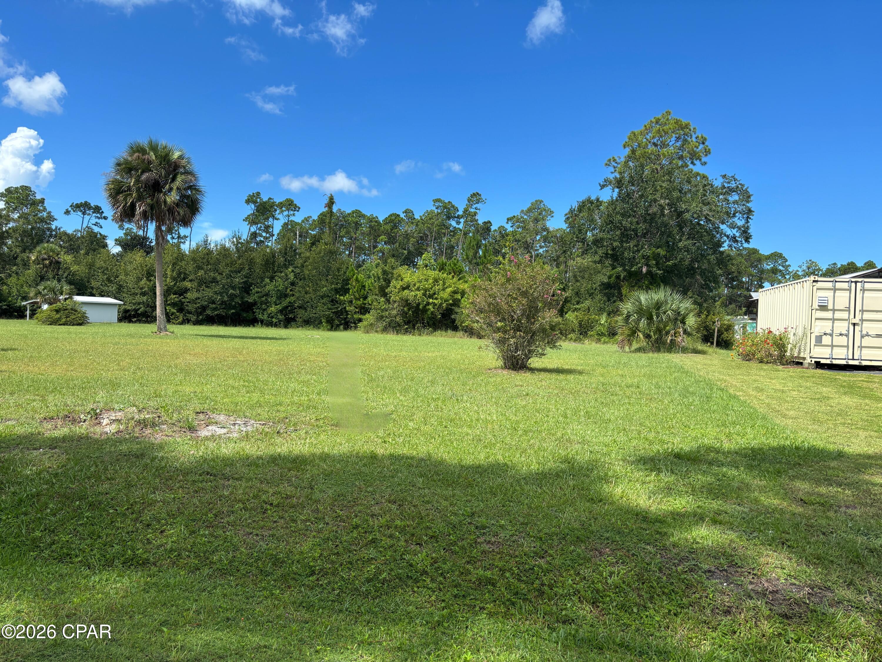 Site ready oversized 1/2 acre plus lots that are golf cart accessible to town, only an easy 3000' distance from St Joseph Bay. NO HOA, X Flood Zone on a major portion of the lot, high and dry with established grass, paved dead end street with no through traffic, water, sewer, electric, propane available and RV compliant. Lot is 3 to 5 times the size of comparable area lots and are priced below market. Lot is a portion of parcel ID # 06223-000R subject to division per the attached rendering. Some information was obtained via the Gulf County Property Appraisers Office, please verify if important.