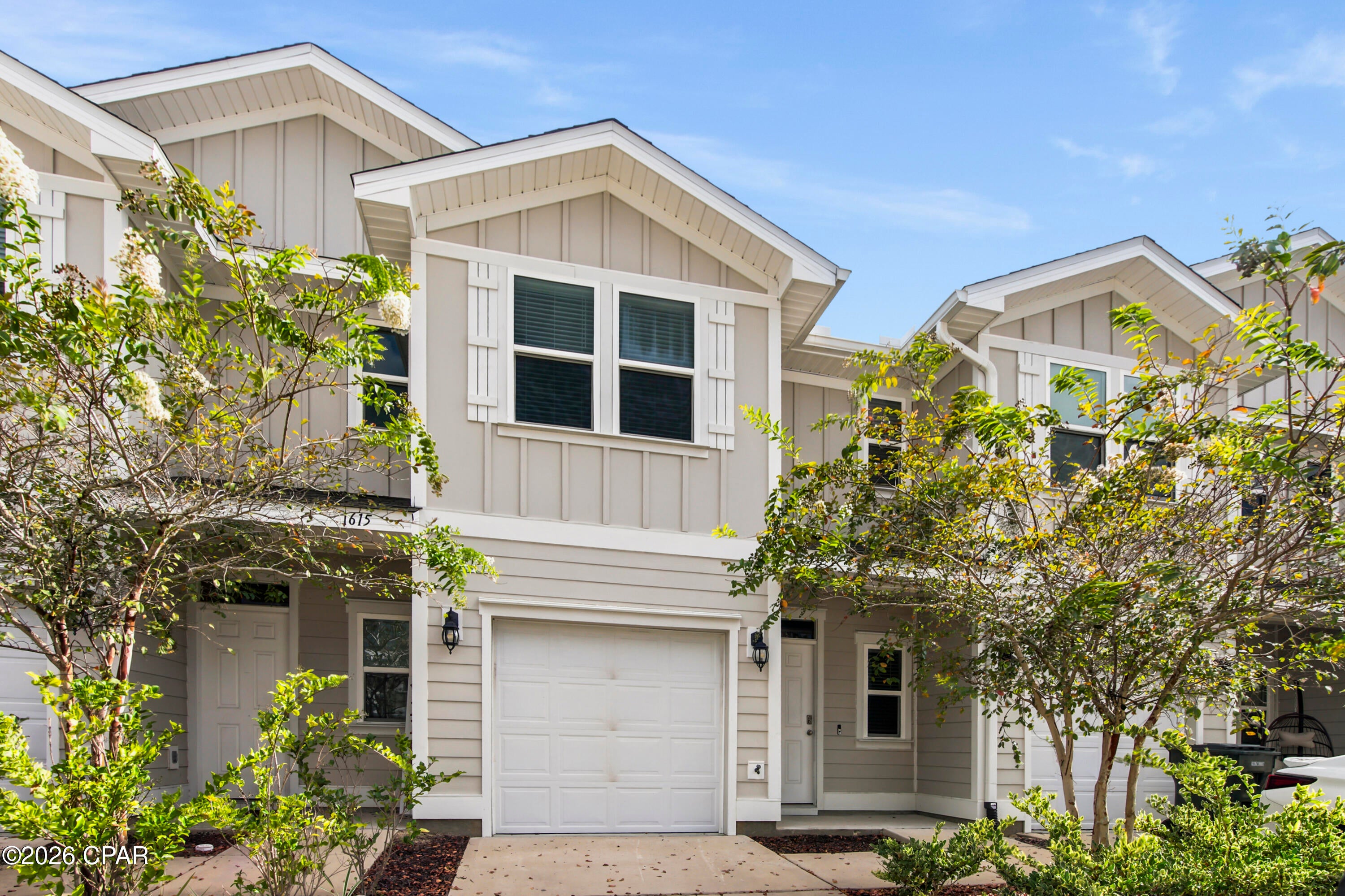 Check out this beautiful pet-friendly townhome in the heart of Lynn Haven, offering a convenient, low-maintenance lifestyle just minutes from shopping, dining, top-rated schools, grocery stores, and more. The first floor features a spacious kitchen with stainless steel appliances, granite countertops, a pantry, and a breakfast bar with seating for four. The large living and dining areas provide plenty of room to relax and entertain, along with a convenient half bath for guests. Upstairs, you'll find three spacious bedrooms, a full-size washer and dryer, additional storage closets, and a full bathroom. The oversized primary suite is a true retreat, featuring a huge walk-in closet and a private en-suite bathroom with a walk-in shower and double-sink vanity. Step outside to enjoy the covered patio overlooking a peaceful open green space and wooded area. With no yard work to worry about and a location just 20 minutes from Tyndall AFB, this townhome offers the perfect combination of comfort, convenience, and easy living. Don't miss your opportunity to make this Lynn Haven gem your next home!