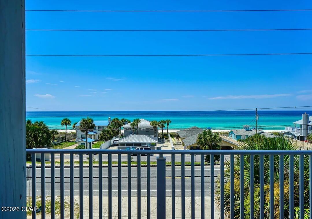 RARE TO THE MARKET -- LUXURY TOP FLOOR/PENTHOUSE LEVEL, 3 GARAGE SPACES & GULF VIEWS - JUST STEPS FROM THE BEACH! Welcome to Vista Del Mar I, an incredibly rare 4-unit boutique complex located directly across the street from the sugar-white sands and emerald waters of Panama City Beach. If you love the beach but could do without crowded high-rise elevators, packed parking garages, and massive resort complexes, this is the property you have been waiting for. Offering approximately 1,800 square feet of beautifully designed living space, this spacious 3-bedroom condo delivers the feel of a beach home with the convenience and flexibility of condominium ownership. Step onto the oversized private balcony and take in gorgeous Gulf views while being only approximately 50 feet from Beach Access #46. Morning walks on the sand, sunset evenings along the Gulf, and spontaneous beach days could not be easier. Remodeled in 2021, the interior showcases beautiful LVP flooring, stainless steel appliances, and an stunning primary bathroom featuring gorgeous shower tile. The open-concept living area feels bright, comfortable, and remarkably spacious, while the kitchen offers generous counter space, stainless appliances, and a large breakfast bar perfect for entertaining family and friends. Read more...

The oversized King Primary Suite creates a private retreat of its own, complete with an ensuite bathroom featuring a large soaking tub and separate walk-in shower. Two additional guest bedrooms--one with a king bed and one with a queen--provide exceptional space for family and guests. With additional sleeping accommodations in the living area, the property can comfortably accommodate up to 10 guests.

And then there is something almost unheard of this close to the beach: PRIVATE GARAGE PARKING AND INCREDIBLE STORAGE! Enjoy parking for up to four vehicles, including two garage spaces, giving you room for vehicles, beach gear, paddleboards, bikes, golf carts, and everything that comes with the Panama City Beach lifestyle.

With only FOUR residences in the entire complex, Vista Del Mar I offers a level of privacy and peaceful coastal living that is increasingly difficult to find in PCB. No endless elevator waits. No navigating a massive high-rise just to reach your front door. No fighting through hundreds of units to get to the beach. Simply park, settle in, and enjoy the Gulf.
The home also showcases a laundry room/closet w/ washer and dryer!

The possibilities here are tremendous. Make it your primary residence, your personal beach retreat, a long-term rental, or take advantage of its short-term rental potential. The combination of THREE bedrooms, approximately 1,800 square feet, Gulf views, exceptional parking, a private garage, and immediate beach access makes this a standout opportunity.

And the location only gets better! You are just steps from the beach while remaining convenient to Pier Park, Shipwreck Island, Topgolf, dining, shopping, entertainment, and approximately 3.6 miles from Frank Brown Park.

ONE OF THE LOWEST-PRICED 3-BEDROOM OPPORTUNITIES IN PCB -- with space, privacy, Gulf views, garage parking, and the beach practically at your front door.

Vista Del Mar I rarely comes to market. When you combine this much square footage with a boutique 4-unit setting and one of Panama City Beach's most desirable amenities--the Gulf just steps away--you have a beach property that is anything but ordinary.

Come see what beach ownership feels like without the high-rise lifestyle. This one is special.

More pictures coming soon!