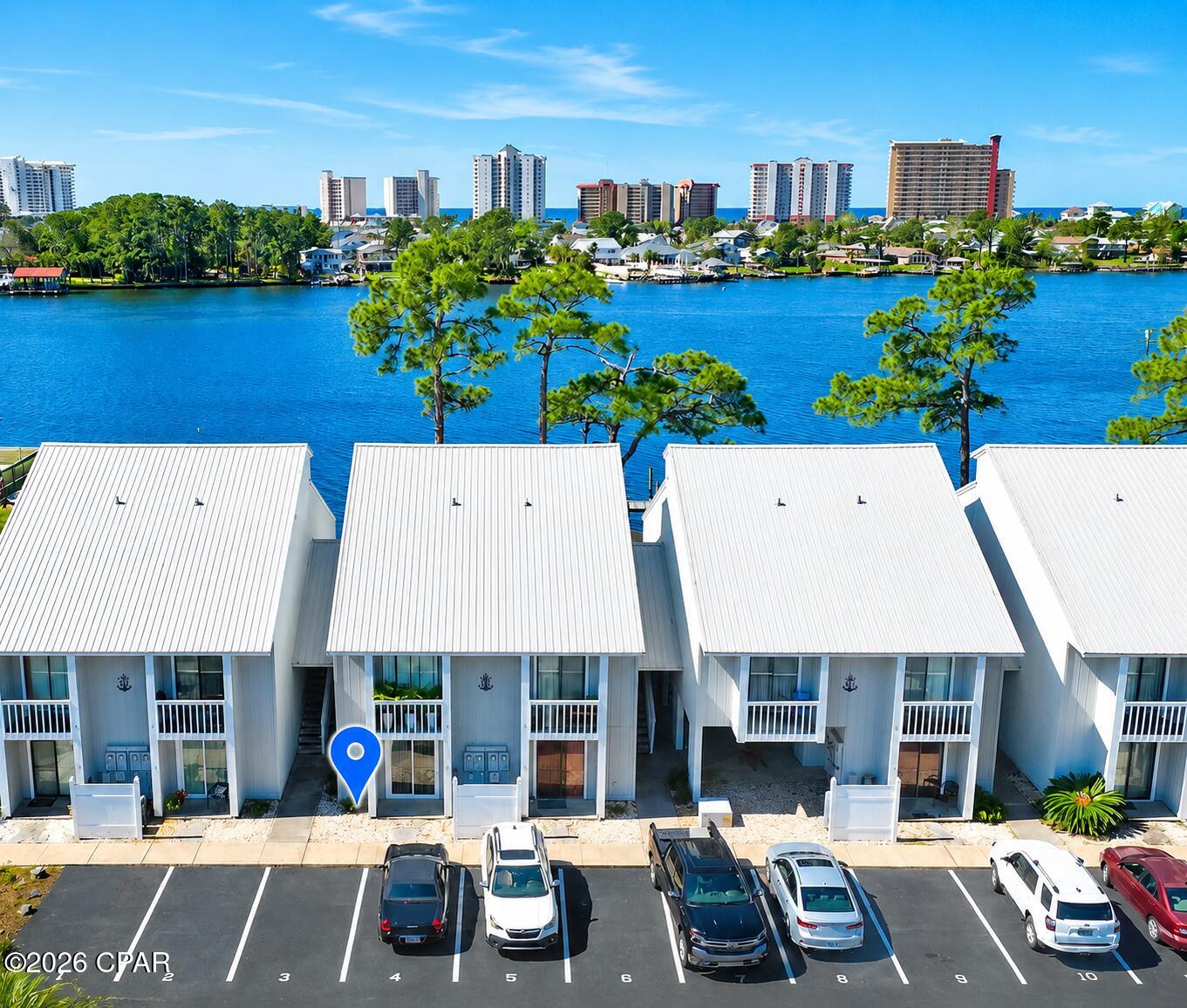 MOTIVATED SELLER! BRING ALL OFFERS!!! Make every day feel like a getaway in this charming first-floor condo! Designed with an open-concept layout, this cozy home offers effortless comfort and flow. Step out onto your private balcony to enjoy spectacular lagoon sunsets. Whether you're fishing, watching dolphins play, or heading to the Gulf (with easy water access) this is true coastal living. Call today for a private tour!