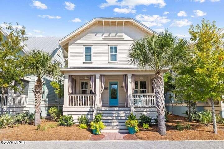 South of 30A and just steps from The Big Chill and Prominence's resort-style pool, this fully furnished Somerset floor plan is currently the only one of its kind available, combining projected rental income of up to $150k, a first-floor primary suite, and five-bedroom sleeping capacity in one of the community's most sought-after layouts. Designed for effortless coastal living, the open-concept floor plan features spacious living and dining areas, hardwood flooring, and a well-appointed kitchen that serves as the heart of the home. An oversized front porch extends the living space outdoors, creating the perfect setting for morning coffee, evening cocktails, and gatherings with family and friends after a day at the beach. The first-floor primary suite provides privacy and convenience, while the second level offers three additional bedrooms and a bunk room, allowing the home to comfortably accommodate large families and guests. With four full bathrooms, a powder room, and generous living spaces throughout, this home delivers the sleeping capacity and functionality today's 30A buyers are seeking. Offered fully furnished and rental-ready, the home also features a two-car garage, a Tesla charging station, a Nest smart thermostat, a tankless water heater, luxury furnishings, and designer window treatments. Prominence owners enjoy access to resort-style amenities, including a zero-entry pool, seasonal beach shuttle service, and direct access to dining, shopping, entertainment, and family-friendly events at The Big Chill. Ideally positioned between Seaside, Florida, and Alys and Rosemary Beaches, 85 Clipper Street offers the convenience, flexibility, and coastal lifestyle that continue to make Prominence one of the most sought-after communities along Scenic Highway 30A.