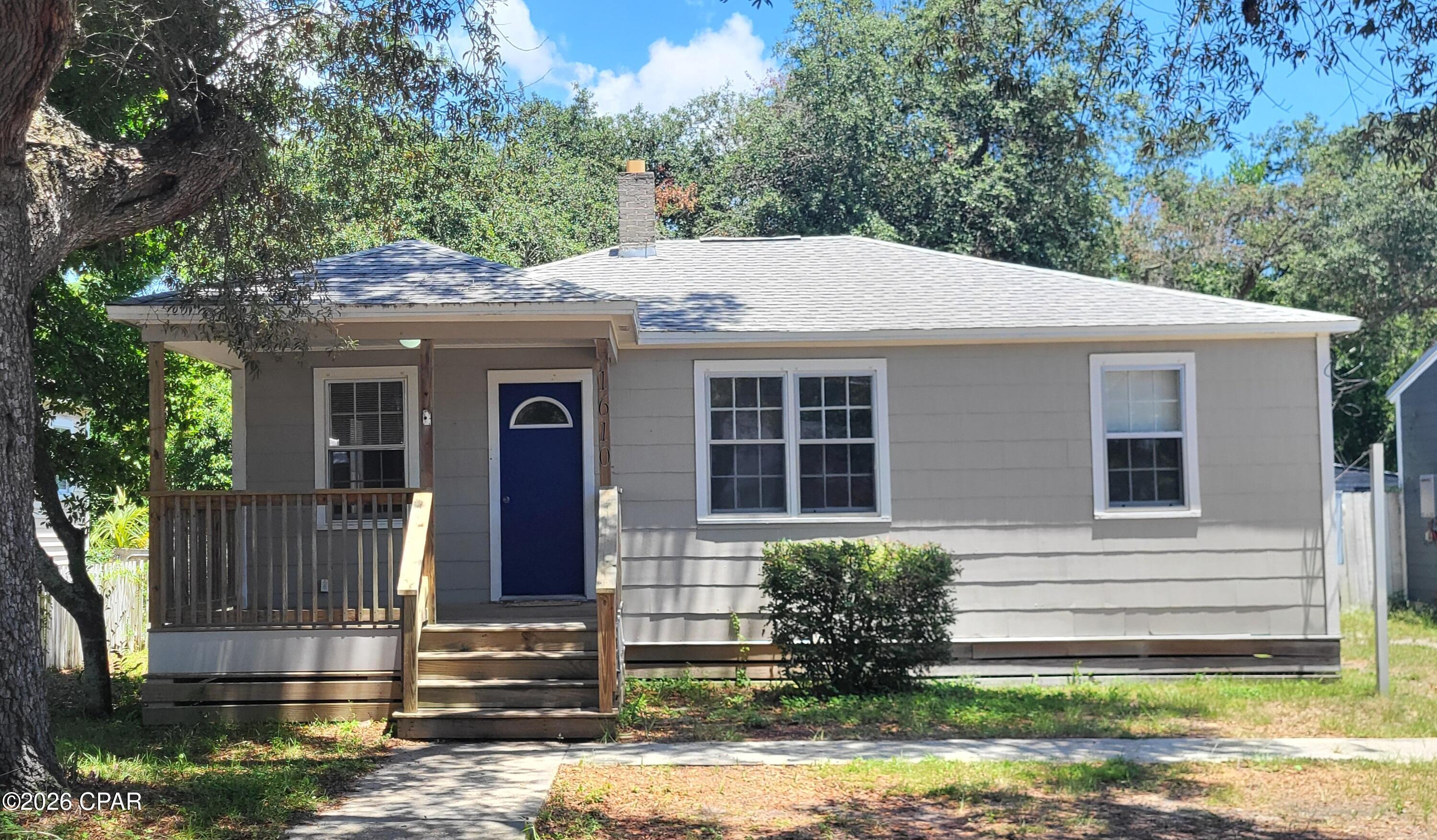 Charming 1941 - built home in a prime Panama City location! This 3 BEDROOM cottage offers classic character with modern updates. Partially REMODELED IN 2020 with new roof, kitchen and bathroom but awaiting your personal upgrades. The separate utility room has enough space to add a half bath, if desired.

The HUGE FENCED BACKYARD is shaded by multiple, MAGNIFICENT OAK TREES- perfect for outdoor entertaining, gardening, outdoor play equipment for the kids, and includes a yard/storage building to stage your weekend projects.

Best of all, this home is located less than a block to LAKE HUNTINGTON, which offers a community BOAT RAMP for easy access directly into the bay! Walkable to the neighborhood park to watch beautiful sunsets over the water. It's also WALKABLE TO DOWNTOWN ST. ANDREWS with convenient access to shopping, restaurants and the MARINA. 

This cozy charmer blends vintage appeal with comfortable living on a gorgeous lot!  Ideal for first-time homebuyers, investors, or anyone seeking a solid, character-filled home in a fantastic waterfront-adjacent neighborhood.