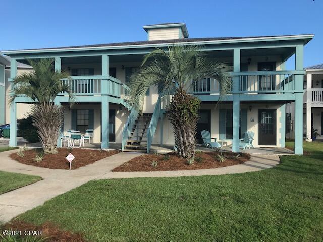 Great Beach Location only a few steps to County access #93. This is a ground Floor two bed two bath unit fully furnished .Only 4 units in the building and plenty of parking The living, dining and kitchen are tiled and carpet in the bedrooms.  Call today for your personal tour.