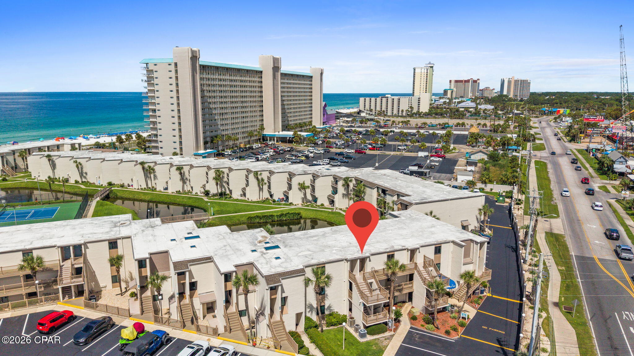 Welcome to Paradise at Sugar Beach!
Located in the Heart of the Sun and Fun of Panama City Beach. This condo is close to some great attractions like Tootsie's Orchid Lounge, it  is a 2-4 minute walk!

Don't miss this incredible opportunity to own in one of Panama City Beach's most desirable gated beachfront communities! Whether you're wanting a high-performing vacation rental, a second home, or your own slice of paradise, this property checks every box.

One of Sugar Beach's biggest advantages? It's one of the few pet-friendly beachfront communities in Panama City Beach, making it a favorite among vacationers and helping your property stand out in a competitive rental market.

Life at Sugar Beach is all about convenience and fun. Forget waiting on crowded elevators--simply park right outside your door for easy access. Spend your days soaking up the sun with private gated beach access, cooling off in the resort-style pool, playing tennis or shuffleboard, grilling with family and friends, or relaxing beside the picturesque koi and turtle pond. Everything you love about the beach is right here!

When you're ready to explore, you'll find some of Panama City Beach's best restaurants, shopping, entertainment, golf, boating, and family attractions just minutes away.

Low quarterly HOA fees include an impressive list of amenities and services:

Water, trash, and cable
Exterior insurance
Beautifully maintained grounds
24-hour video surveillance
Private gated beach access
Resort-style swimming pool
Two tennis courts
Shuffleboard
Scenic koi and turtle pond
Community room with kitchen
Ping pong
Daily on-site maintenance
On-site property management (Monday-Friday)

Properties with this combination of location, amenities, convenience, and pet-friendly appeal don't come along often. Whether you're building memories with family or maximizing your investment potential, Sugar Beach offers the best of the Panama City Beach lifestyle.

Come see why so many owners and guests return to Sugar Beach year after year--your beach paradise is waiting!