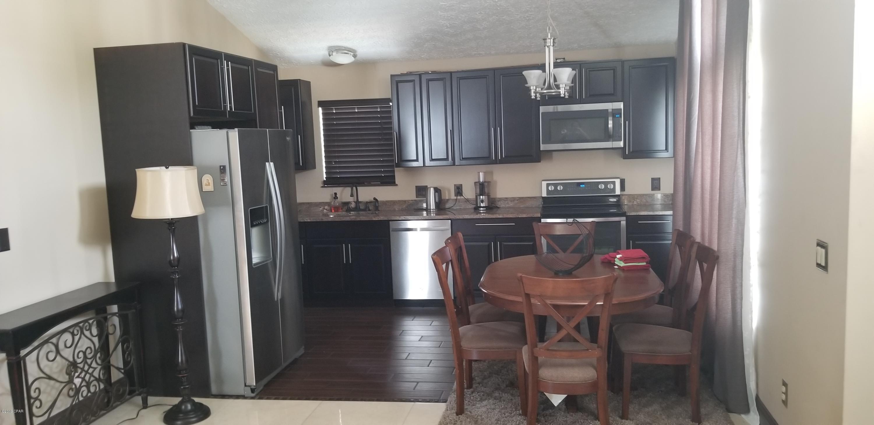 Located in Palm Cove Subdivision, this updated home offers Granite Counters, Newly finished cabinets, Stainless Steel Appliances to include dishwasher, Marble tiled floors in living area, Washer and Dryer included.
