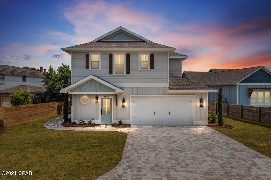 UNDER CONTRACT WITH KICKOUT CLAUSE TAKING BACKUPS NO HOA and home is NOT IN FLOOD ZONE!!!  Enjoy waterfront living with easy access to beautiful white sand beaches, shopping, entertainment, fine dining and only a few minutes away from St. Andrews State Park or travel by boat from your private dock to the open waters of the Gulf of Mexico.  This newly built custom home features 2x6 construction, impact resistant windows, 9ft ceilings, commercial grade luxury vinyl floors throughout, wood shelving in all closets, and several surprise designer touches.  It offers 2092 sq. ft. of indoor living space, 3 large bedrooms with 2 full bathrooms and a powder room.  You will love this open plan with lots of windows for natural light or you can slide open the 15'w x 8.6'h Room for pool-see rendering.