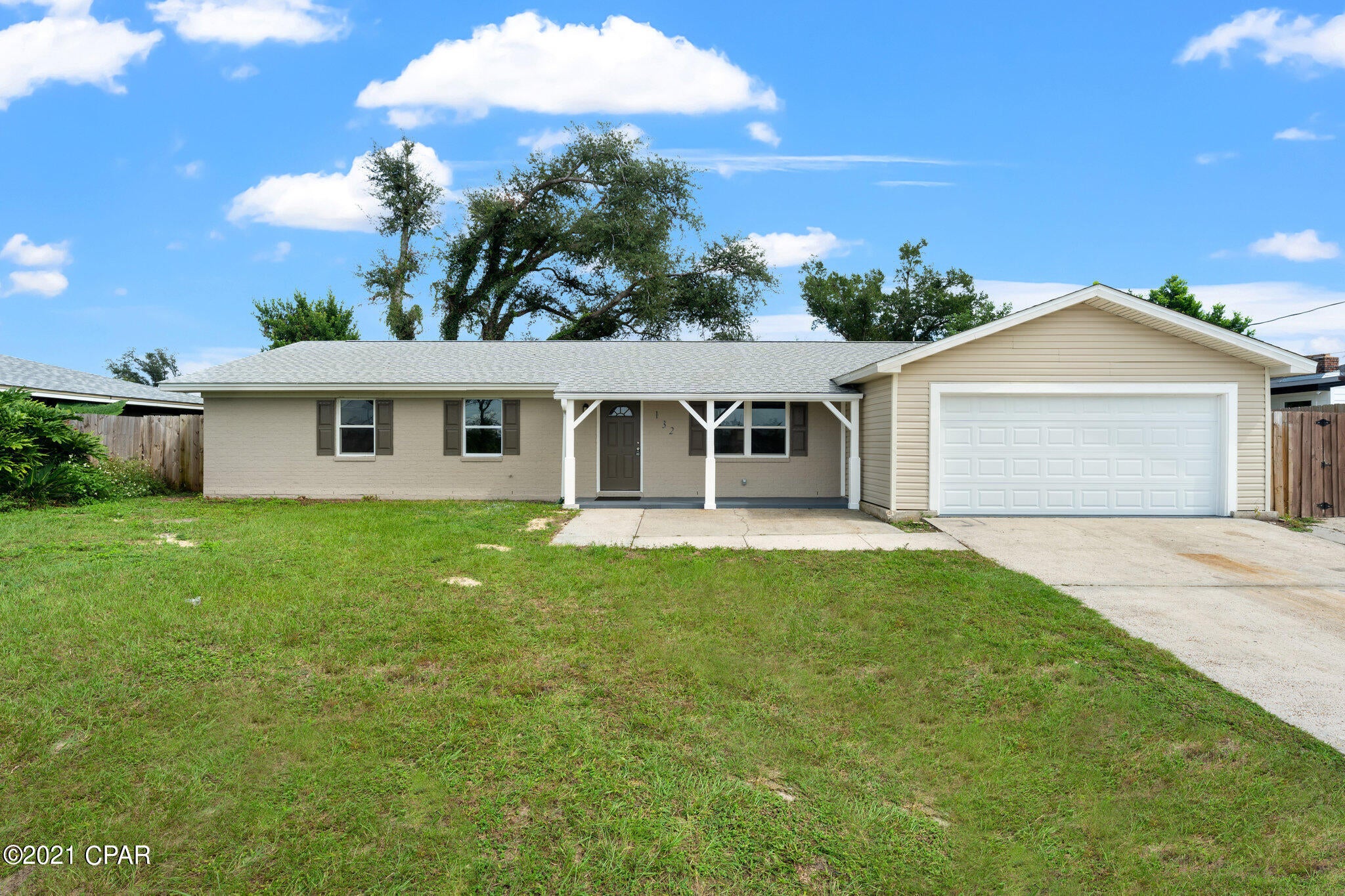 Beautifully remodeled family home close to Tyndall Air Force Base.  This 3 Bed/2 ba plus a den/office that could be a 4th bedroom features all new carpet in the bedrooms LVP flooring in the main areas.  The kitchen overlooks the dining/living area and features beautiful quartz counters, stainless appliances and an oversize eating bar for those quick meals. Through the French doors in the living area, you will find a Florida room just perfect for enjoying the evenings while watching the kiddos play in the fully fenced backyard.  There is even a peek-a-boo view of Lake Martin and an oversized driveway for parking all your toys.  This home will sell fast... so do not delay!