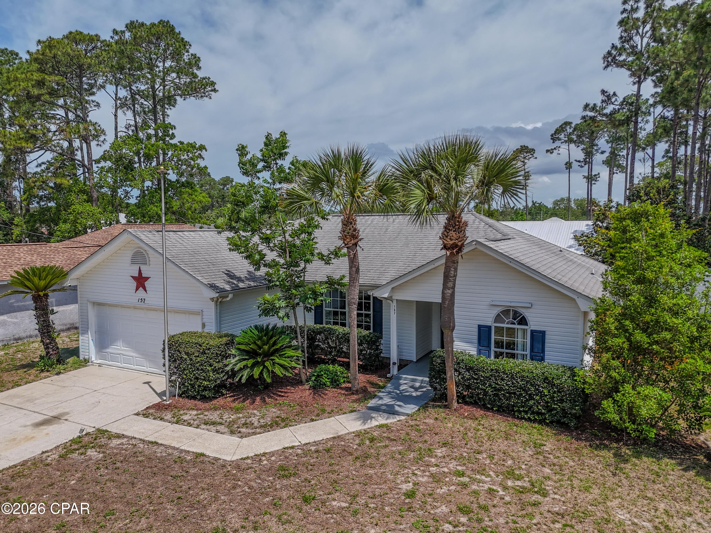 Centrally located 3/2 Home with plenty of storage on a oversized lot almost 1/3 of an acre. This home is located just 3 minutes to the beach and 3 minutes to the new Tallahassee Memorial Hospital location and less than 2 miles west of Pier Park. 2 storage sheds on the property and plenty of yard and space for your boats, trailers or toys! Plenty of natural sunlight in the kitchen/Florida Room which can be used as a dining area, the home sits in a non flood zone and NO HOA! There is plenty of deck space in back and both sheds have window units and make great work space and storage. Scott Field Park is located directly across the street from the home which gives a safe environment for children or pets to play.