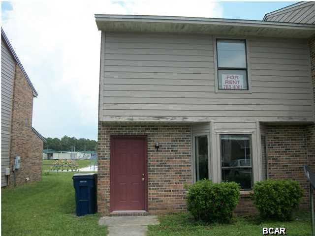 Centrally located end unit town home within walking distance to Northside Elementary; shopping amenities on 23rd and 15th Streets are nearby. Washer/dryer hookups and storage in utility closet off kitchen; outside storage room that locks, and open patio. NO PETS, NON-NEGOTIABLE. Room sizes are from builders plans; owner is listing agent. $30.00 application fee. One year lease required.