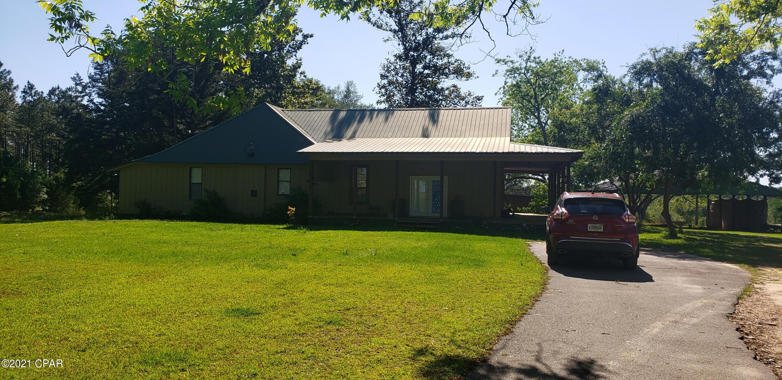 Currently under contract seller taking backup offers.. This property is so gorgeous! Huge pecan trees, great pastures two nice out buildings. There is a great lake to fish in too! Farm house has had some renovations but could be a show place with your renovations!  Come make your mark on it!!