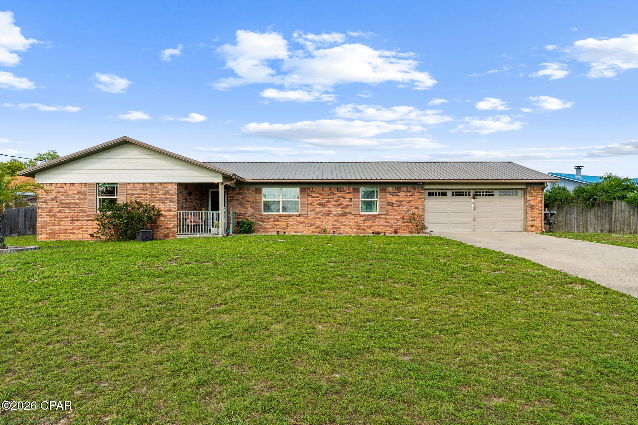 Property is currently under contract. Seller is accepting backup offers and encourages continued showings! Welcome to 1511 Donna Avenue! This 3-bedroom, 2-bath home offers a functional layout and a fantastic location in Panama City, just a short drive from Tyndall Air Force Base, Under the Oaks Park, and the bay.

Inside, you'll find a spacious living room featuring a beautiful beamed cathedral ceiling, a cozy wood-burning fireplace, and a kitchen with a large center island that's perfect for gathering with family and friends. The primary suite includes a walk-in closet, while the additional bedrooms offer flexibility for family, guests, or a home office.

Step outside to enjoy multiple outdoor living spaces, including a screened-in porch, a covered deck, and an adjoining open deck. The detached storage building with electricity is perfect for a workshop, hobbies, or additional storage.

Conveniently located near shopping, dining, schools, and parks, this home offers plenty of space to enjoy both indoors and out. Schedule your private showing today!