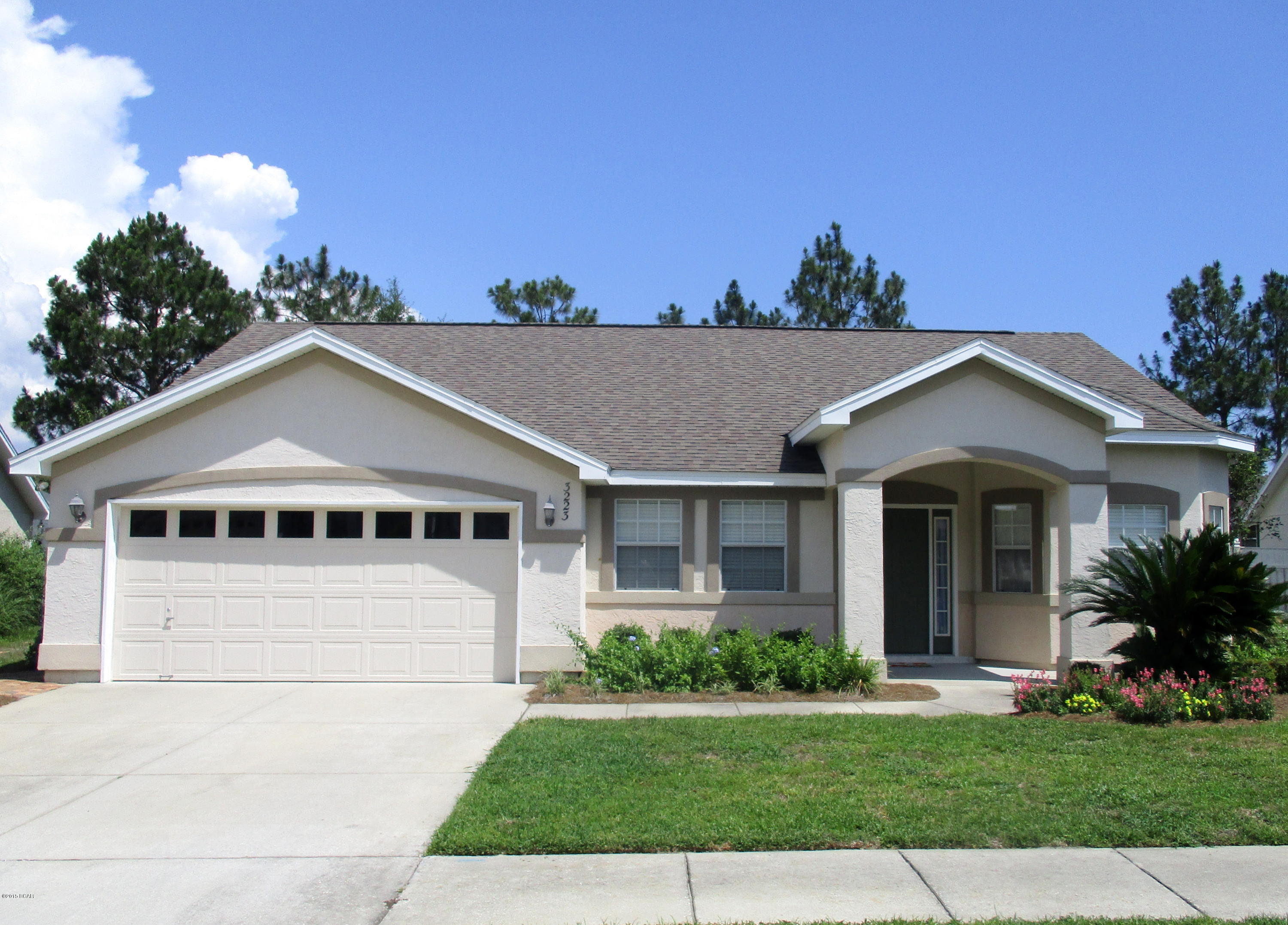 Very nice home located in The Hammocks, conveniently located to everything '' restaurants/retail, Tyndall AFB, Naval Coastal Service Center and Bay Haven Charter School. Entering from the covered front porch to a large entry foyer, you then find the large, comfortable family room - with cathedral ceiling and fireplace. Also, just off the entry foyer is a large dining room, with cathedral ceiling, that can easily double for an office area. The fully kitchen is just off the family room - includes cathedral ceiling, granite counter-tops, breakfast bar, pantry, appliances; and has adjacent to it a breakfast nook. The master suite includes two large walk-in closets; and the en suite master bathroom includes double vanity. The additional bedrooms are comfortably sized and include plenty of closet space. Interior features include cathedral ceilings, ceiling fans and gas-burning fireplace. The double garage includes automated opener and pull-down stairs for attic access. Exterior features include nicely landscaped yard, sprinkler system, privacy fenced rear yard, and large rear covered porch (18x8). Thank you for considering this home!